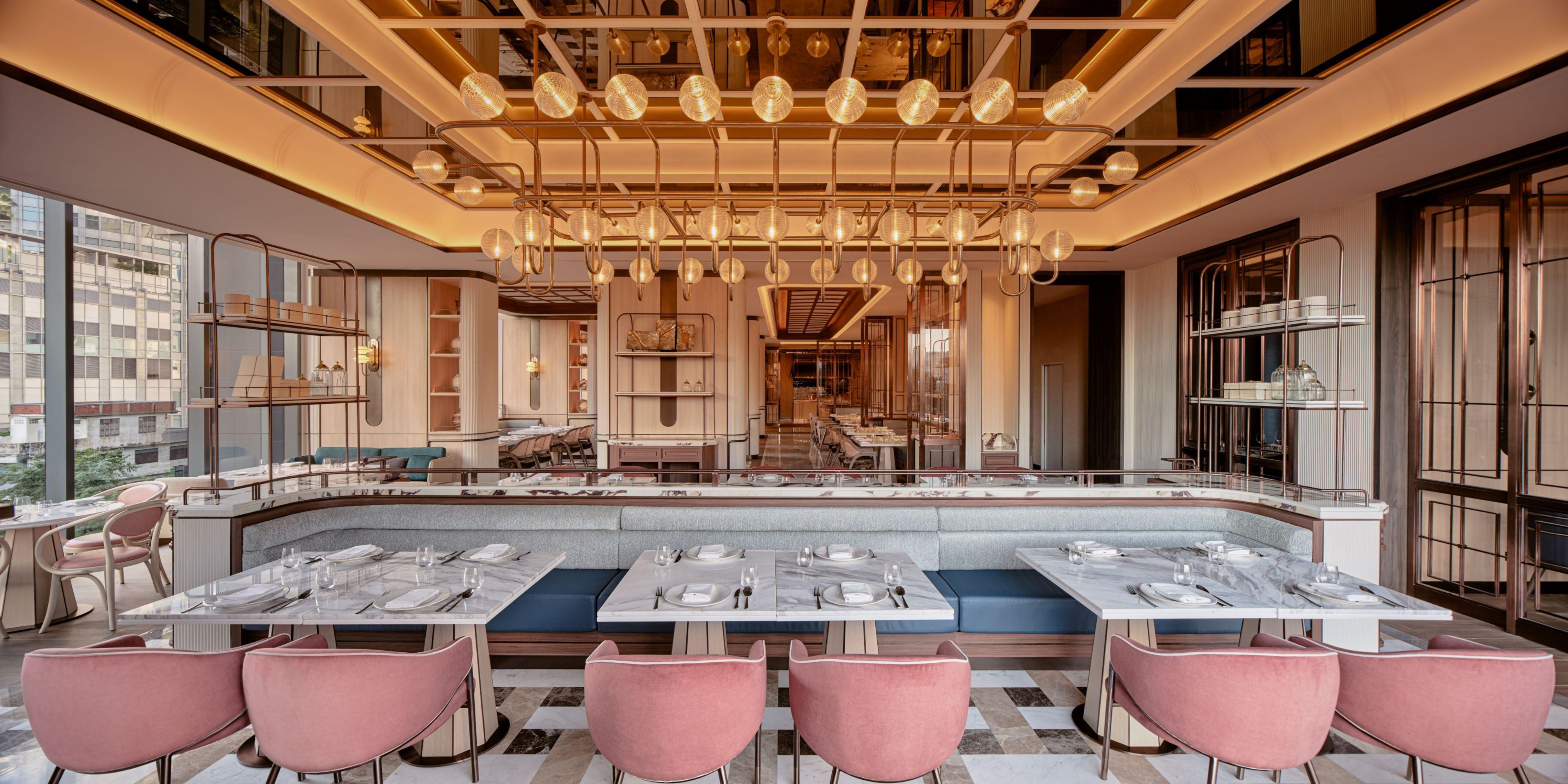 As a true gastronomic hub in Bangkok's thriving neighbourhood, our hotel offers diverse culinary experiences. Relax in The Lobby, our chic, inviting lounge perfect for socializing. Savour all-day dining at AVA Brasserie with its fusion of international flavours and aviation-inspired design or explore Rogues, an intimate speakeasy and hidden gem.