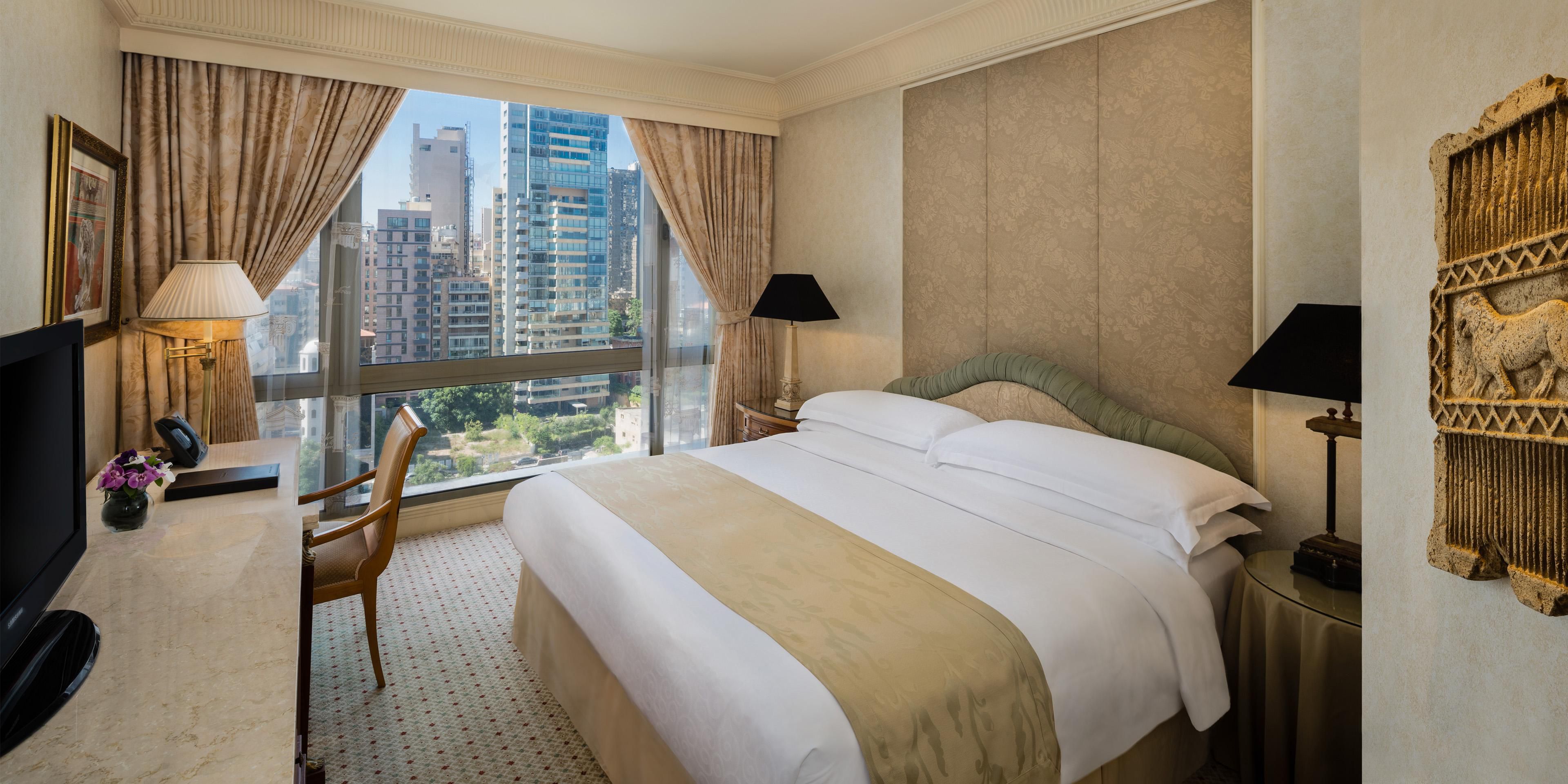 Enjoy fabulous city views in the Classic Queen room