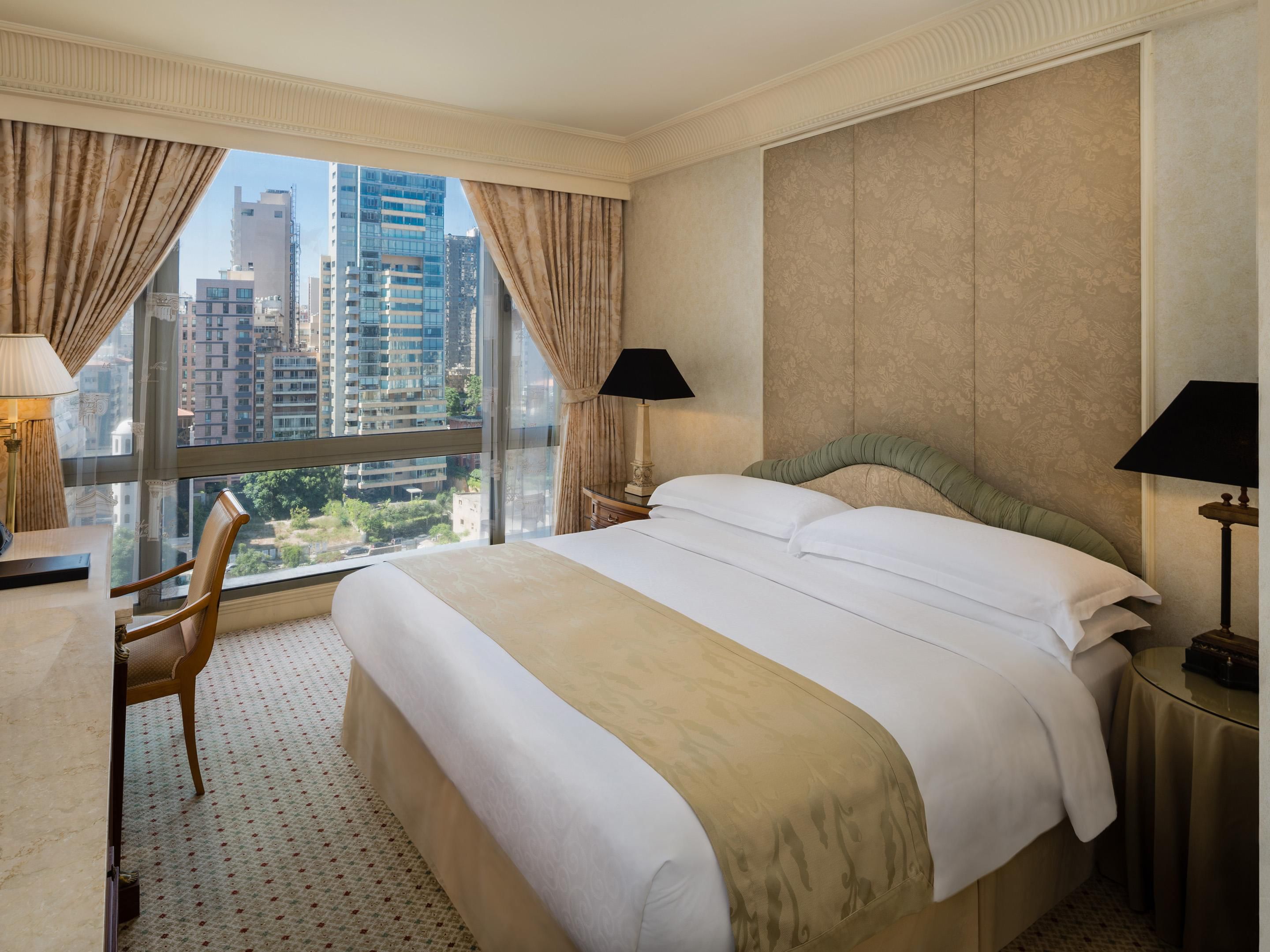 Enjoy fabulous city views in the Classic Queen room