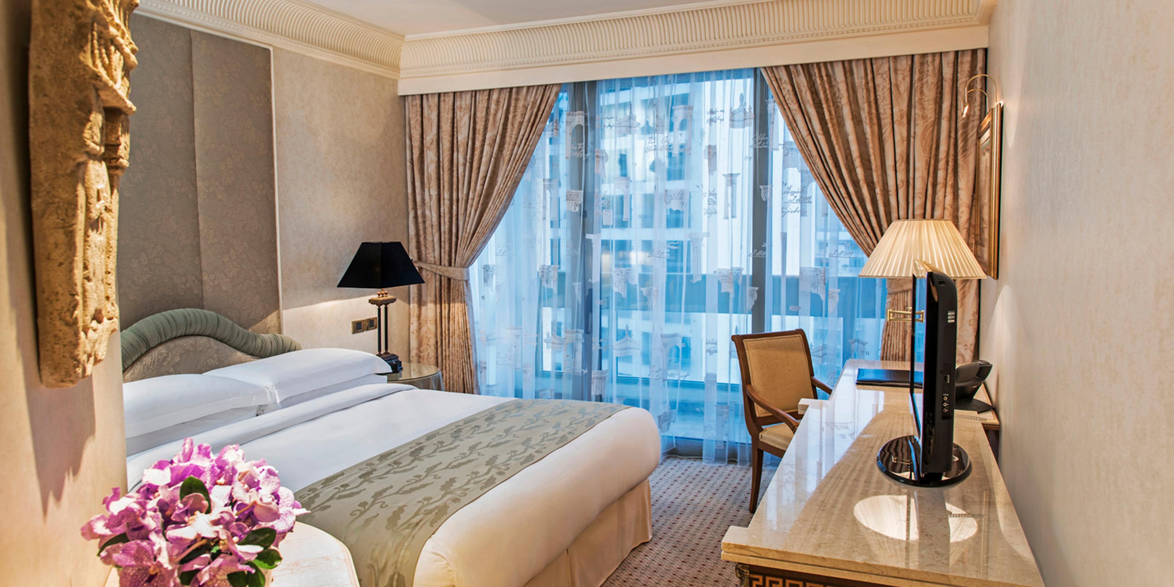 Style meets comfort in the Classic Queen Bedroom