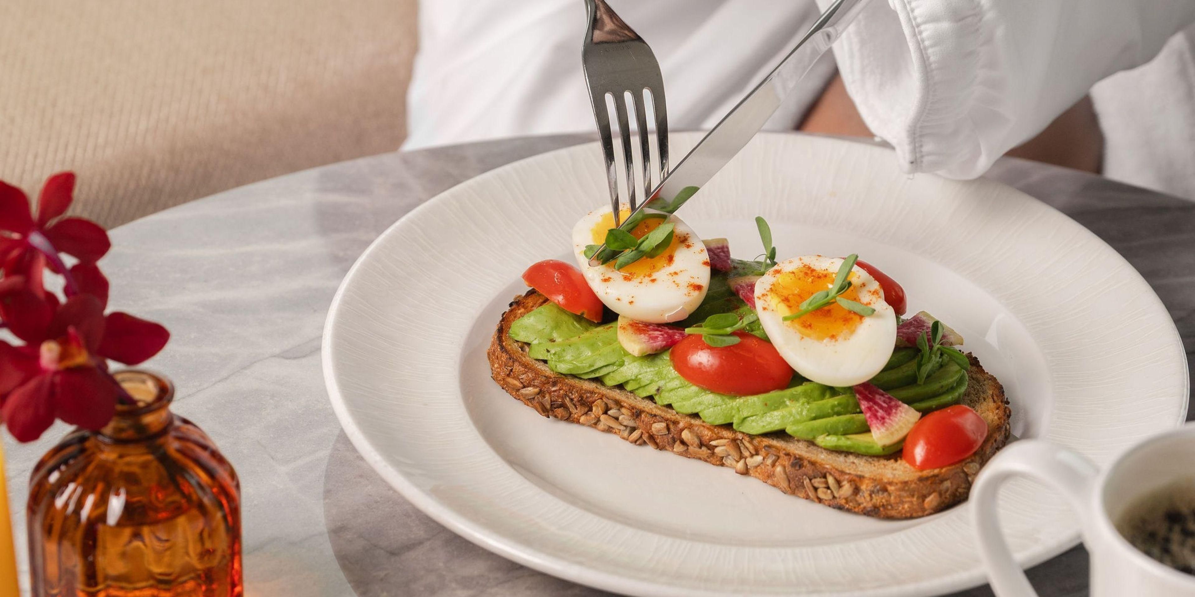 avocado toast with egg and tomato