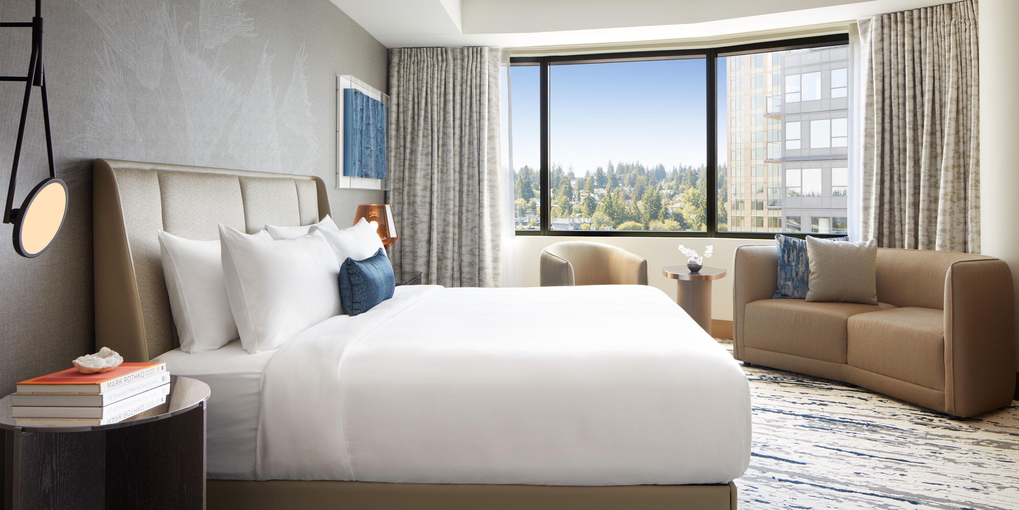 Lavish Junior Suite with living area & sublime neighborhood views