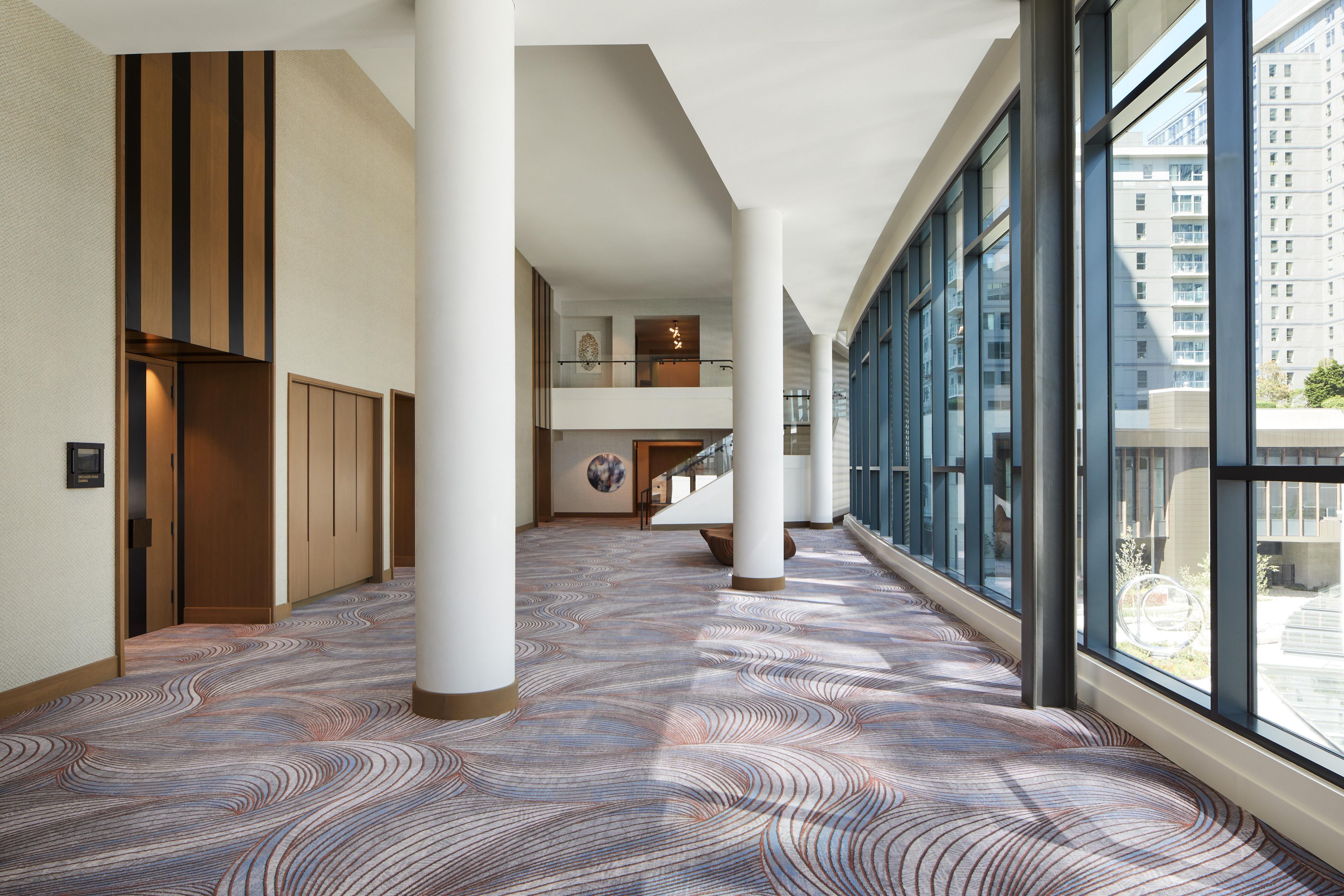 Avenue Foyer event space floor-to-ceiling views & natural light 