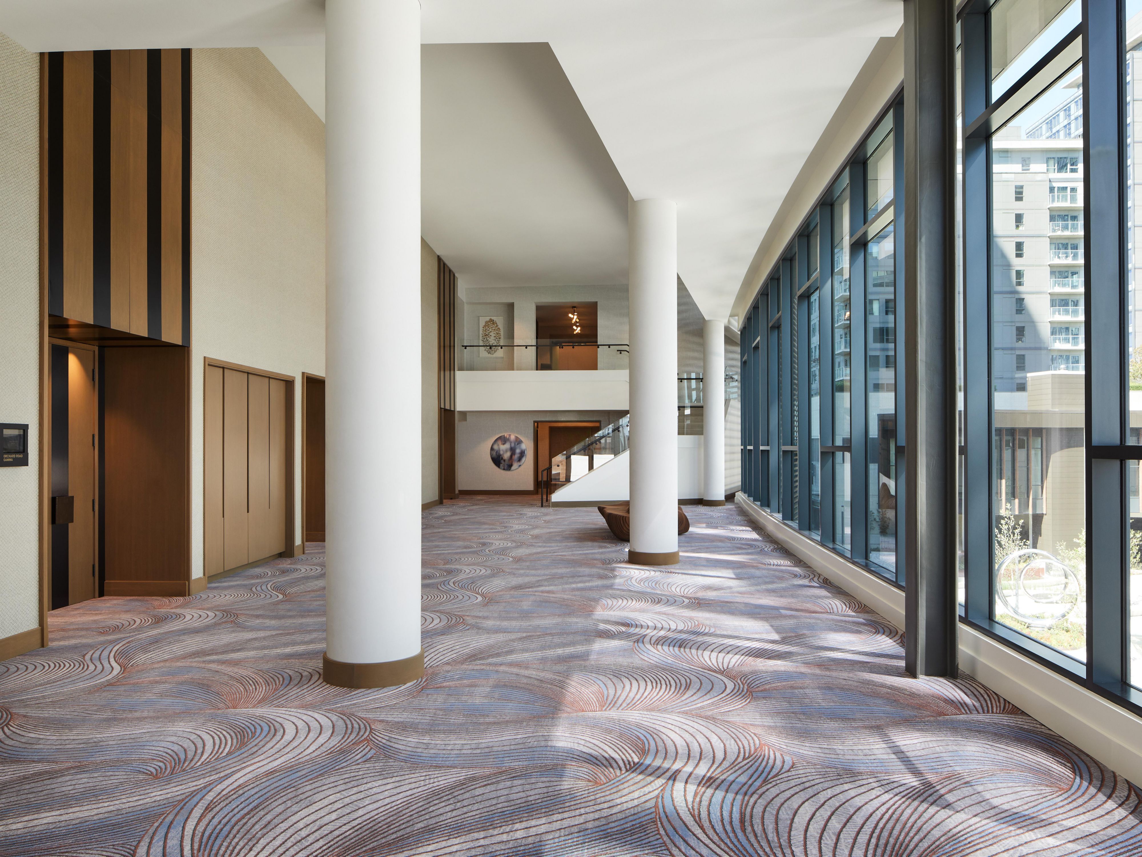 Avenue Foyer event space floor-to-ceiling views & natural light 