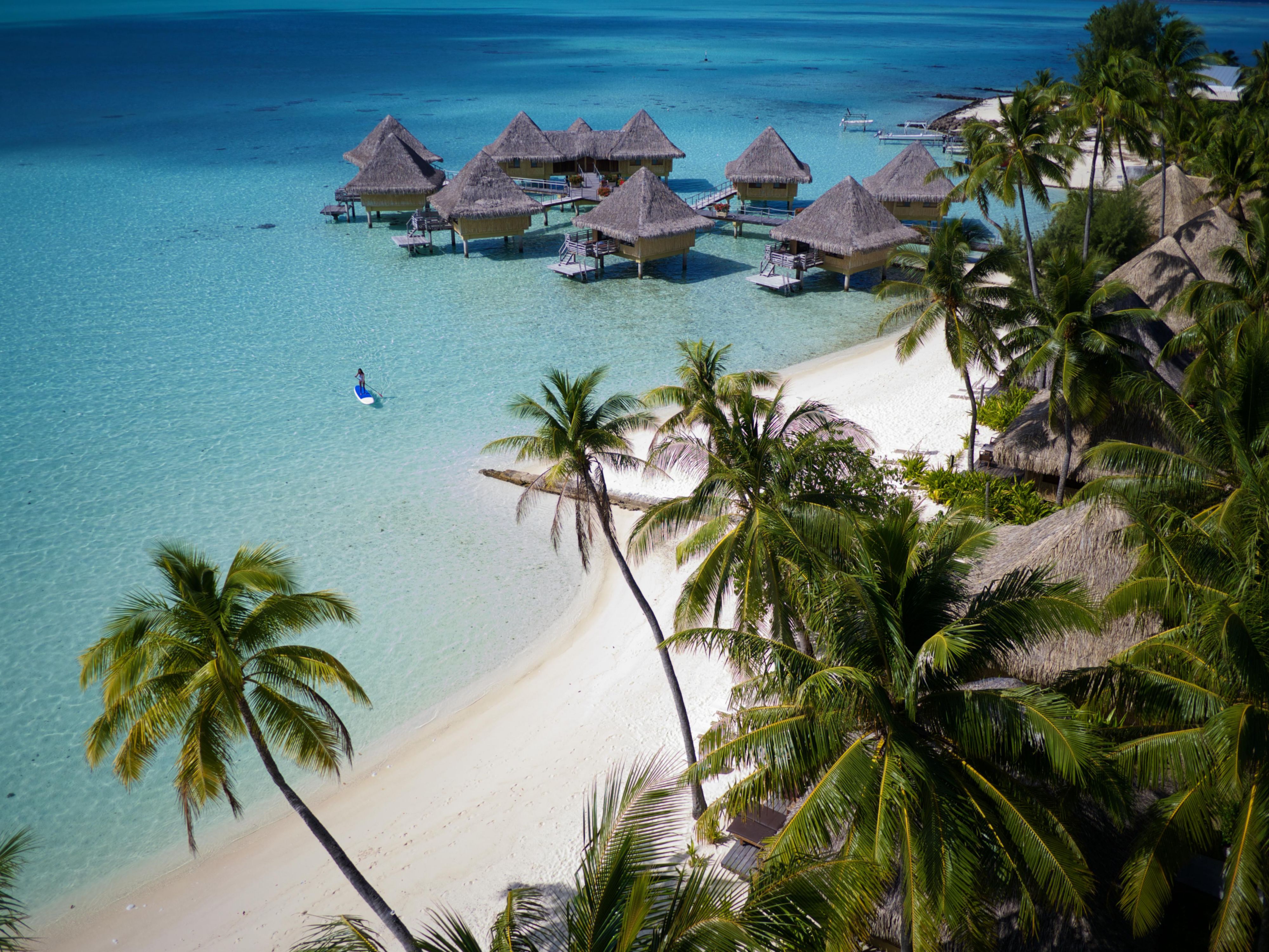 Aerial View over the beach and bungalows
