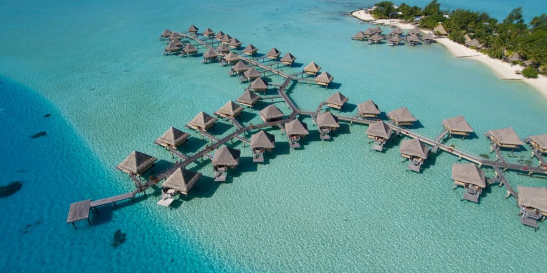 Stunning white sand curve of Matira Beach in Bora Bora