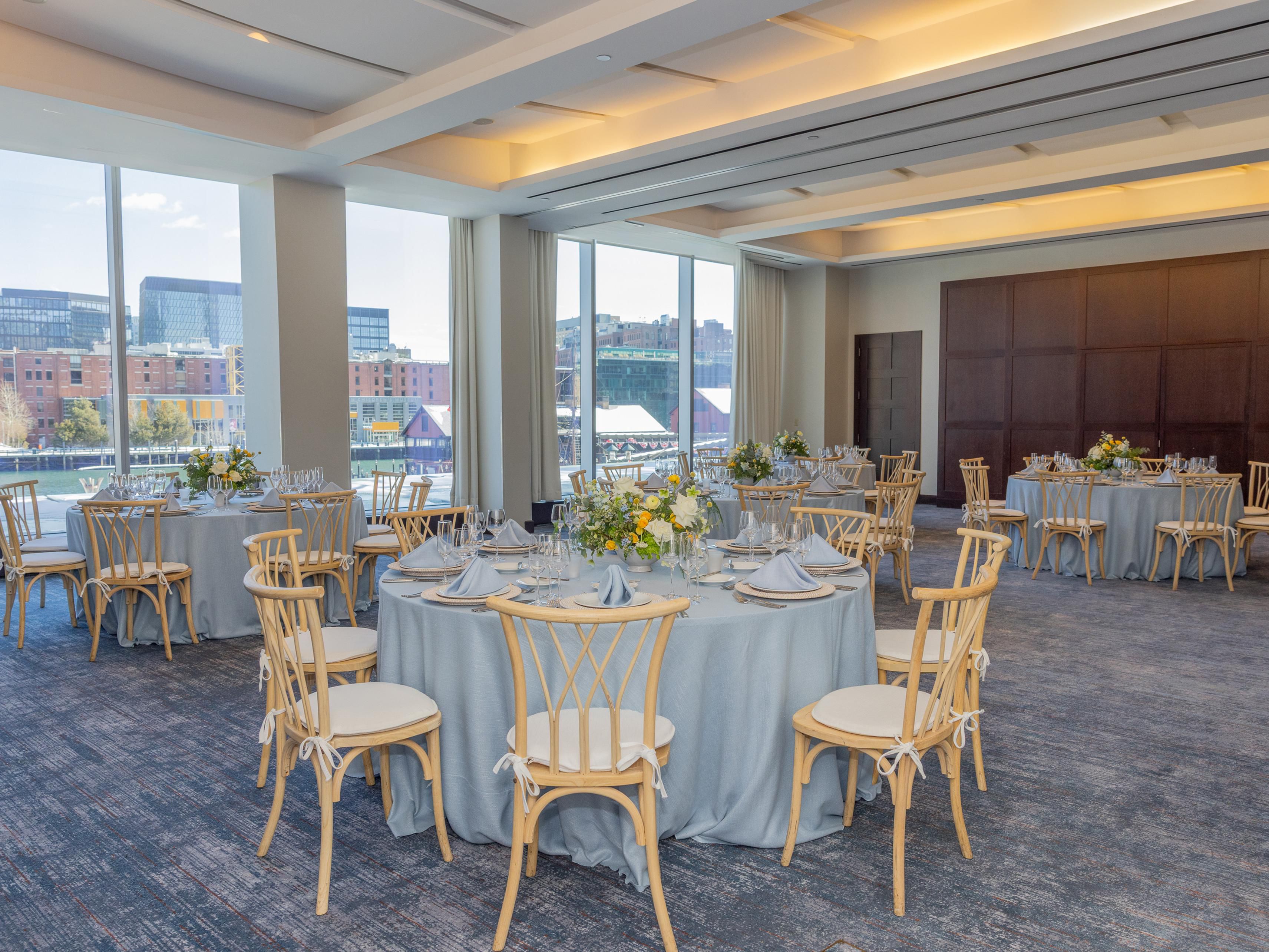 Griffin Room set up for a wedding reception with tables and decor.