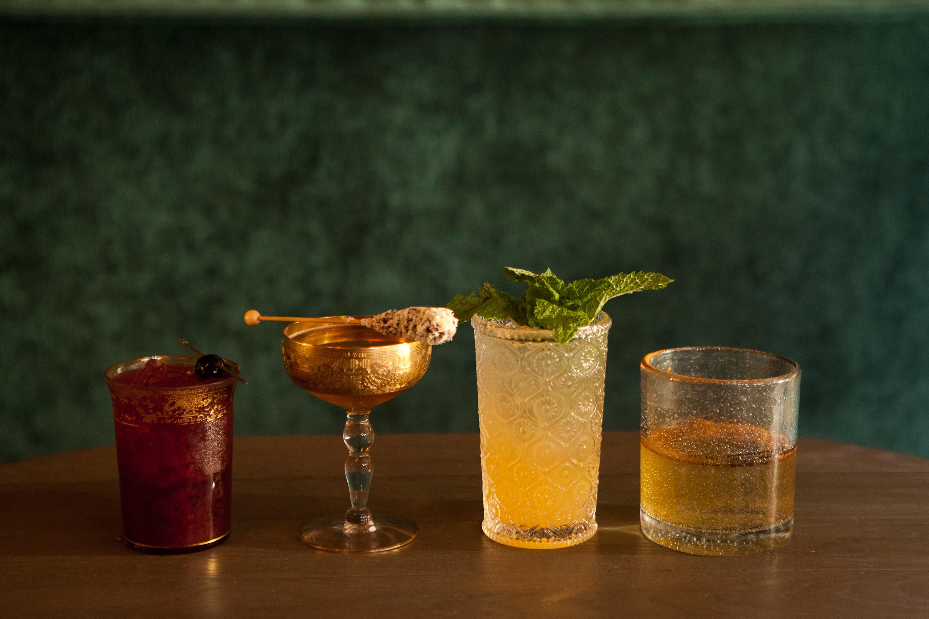 Chilled crafted cocktails in unique decorated glassware from Loyall Bar 