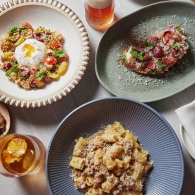 Italian cuisine including bolognese and burrata salad at Matria 