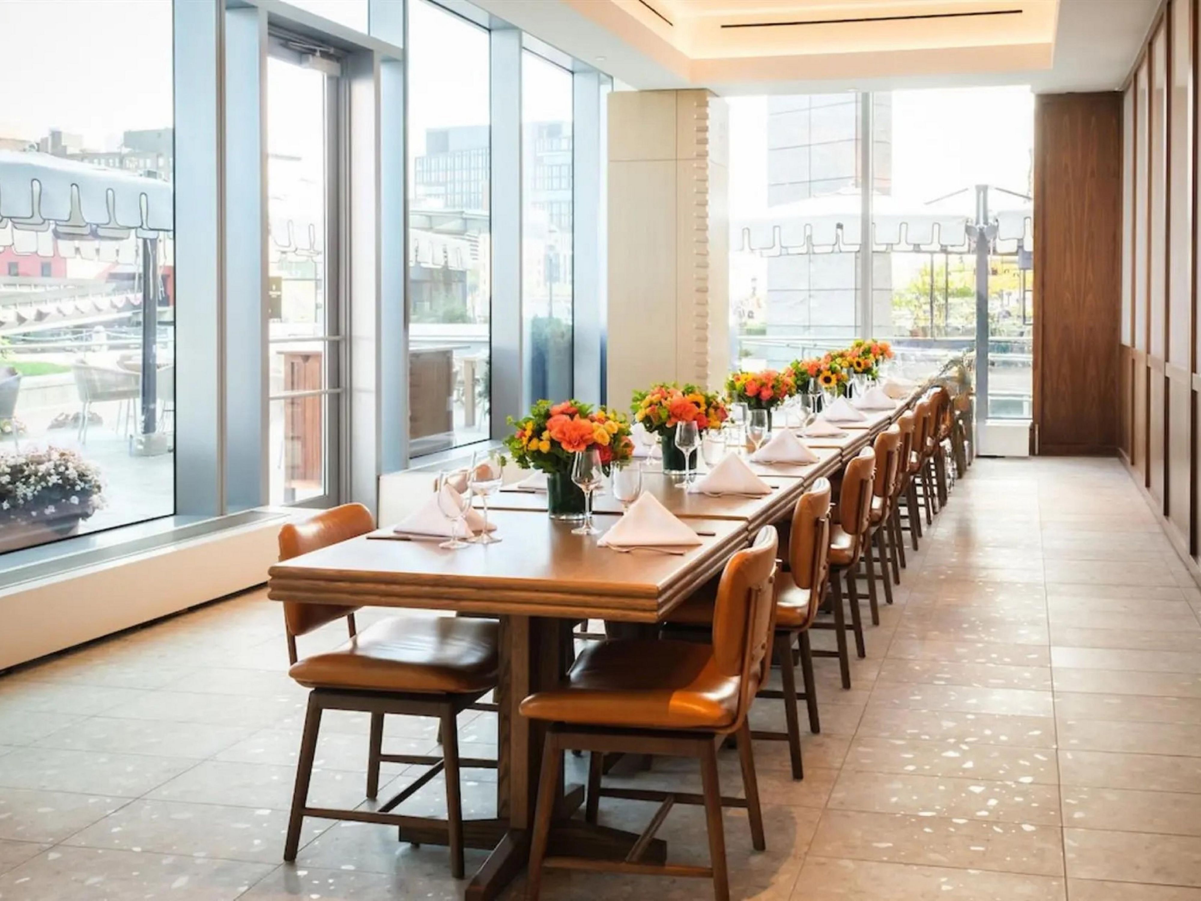 Table set with flowers and eatery