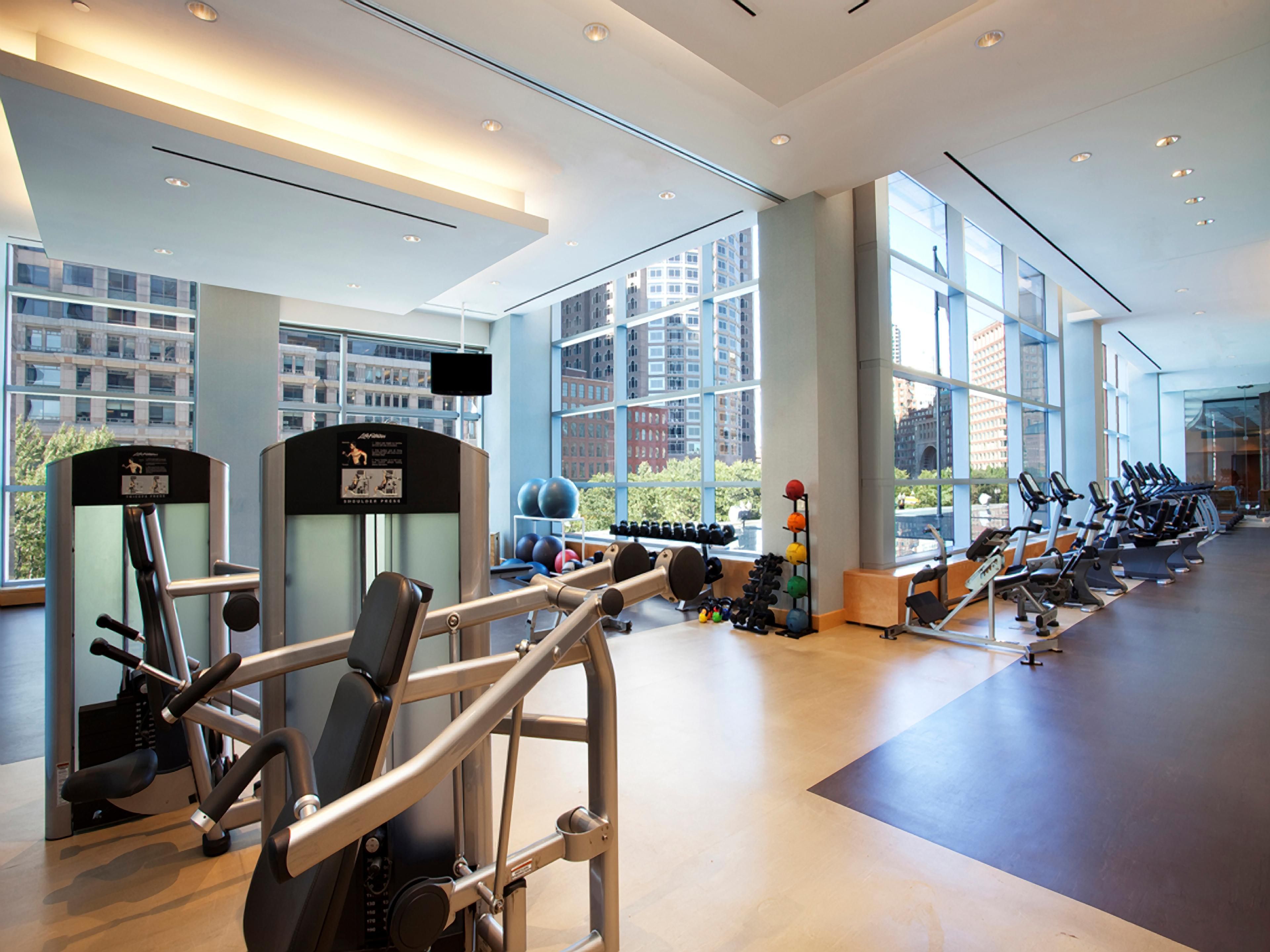 Fitness Center with treadmills, machines, and space to do yoga