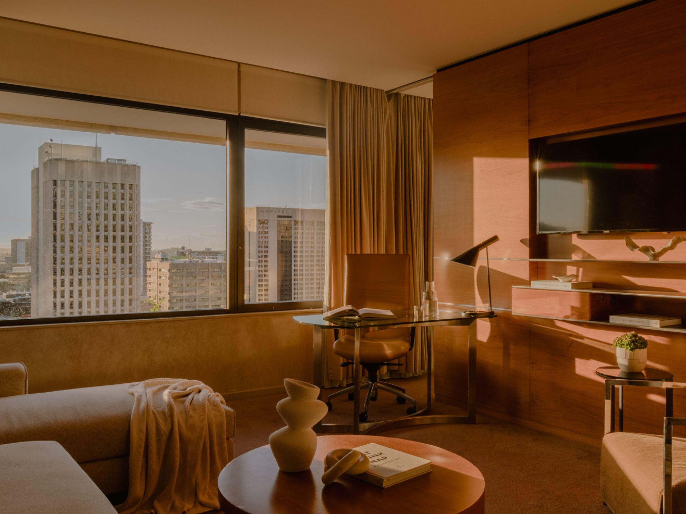 Suite lounge and work space with city views