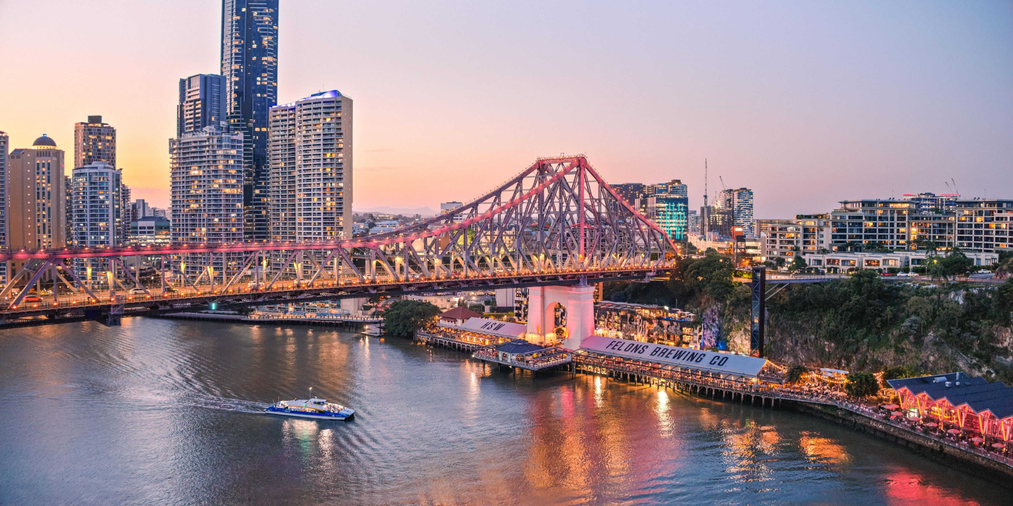 As the sun sets, make your way to Howard Smith Wharves, where award-winning bars, riverside restaurants, and breweries await. Sip cocktails as the Story Bridge glows and the city skyline shimmers at golden hour.