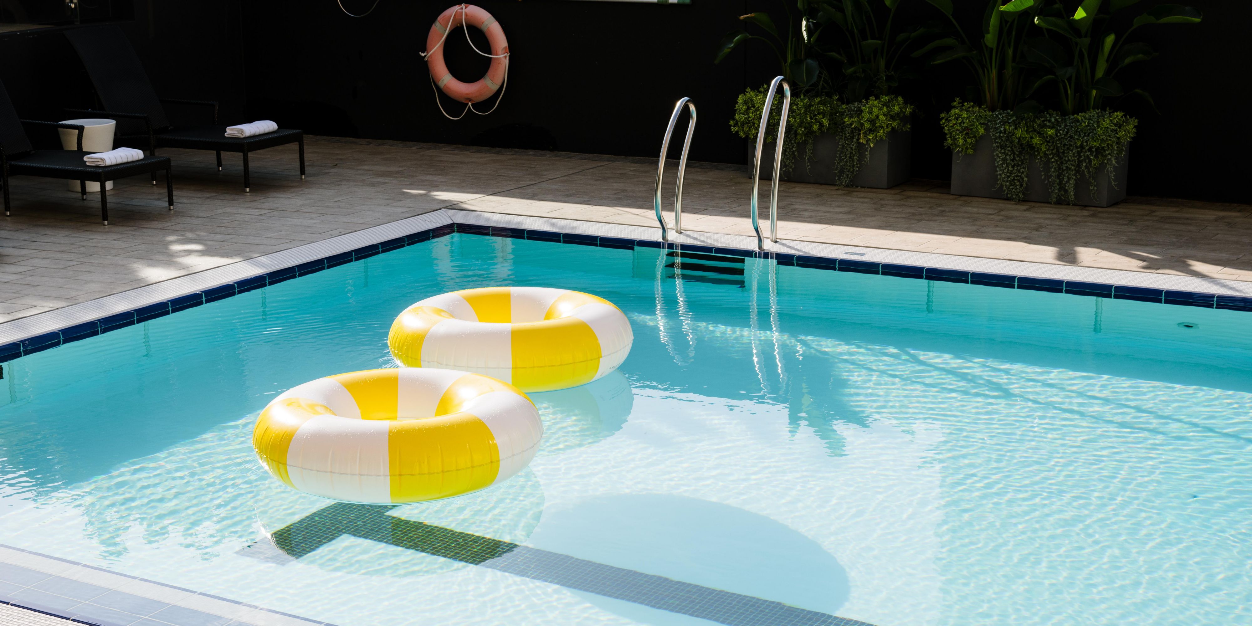 Unwind by the Swimming Pool with Sweeping Brisbane Skyline Views