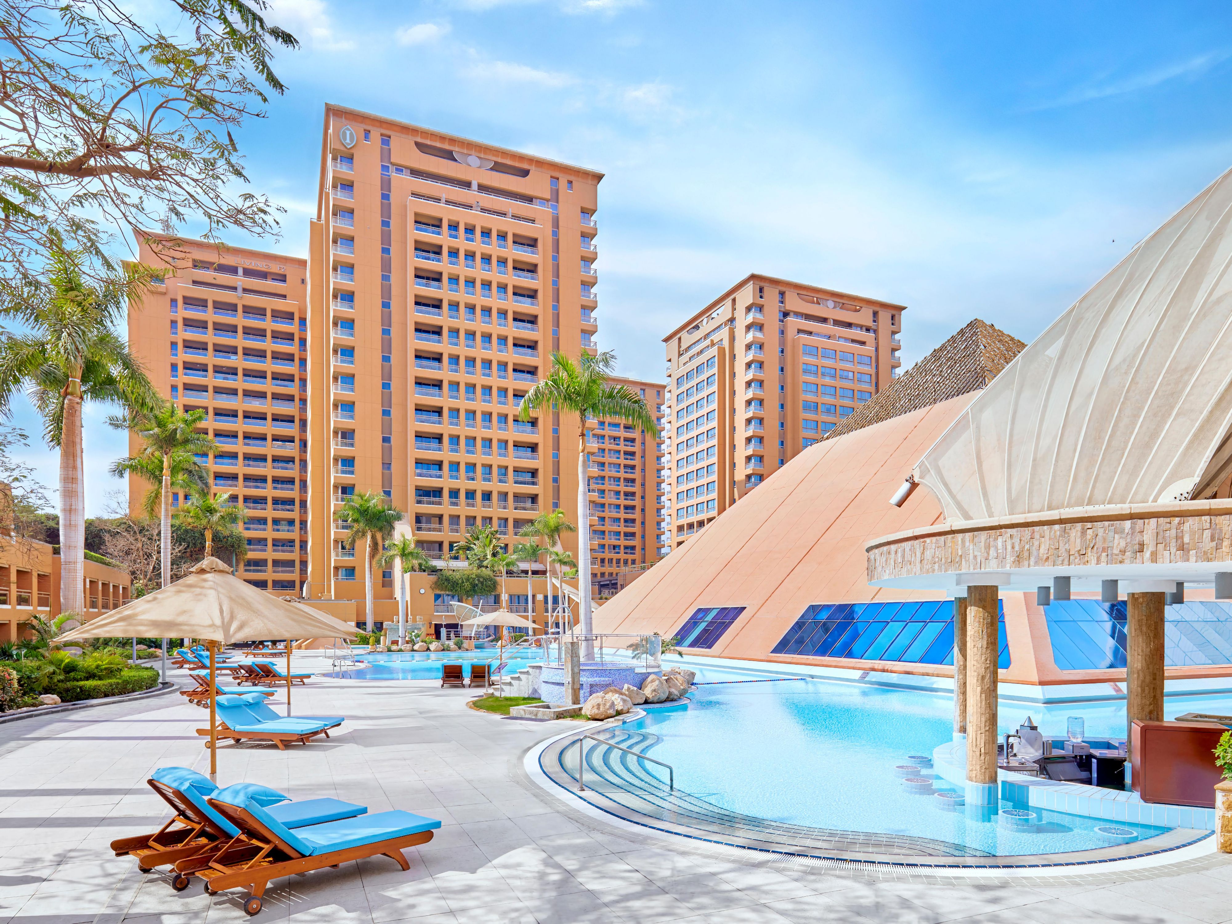 Outdoor pool, a relaxing escape in a refreshing poolside setting