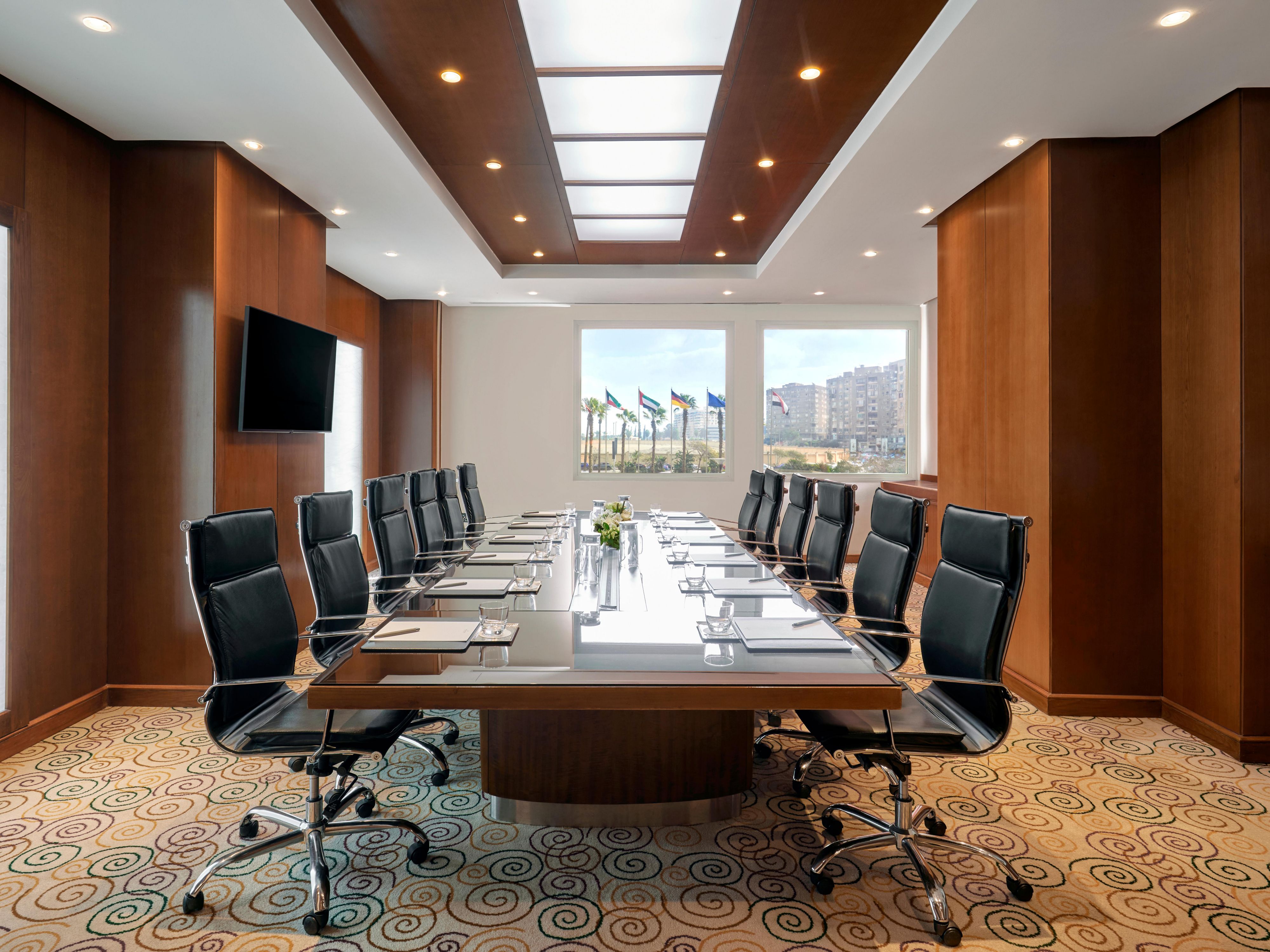 Baron Meeting Room – An executive setting with a fixed board table