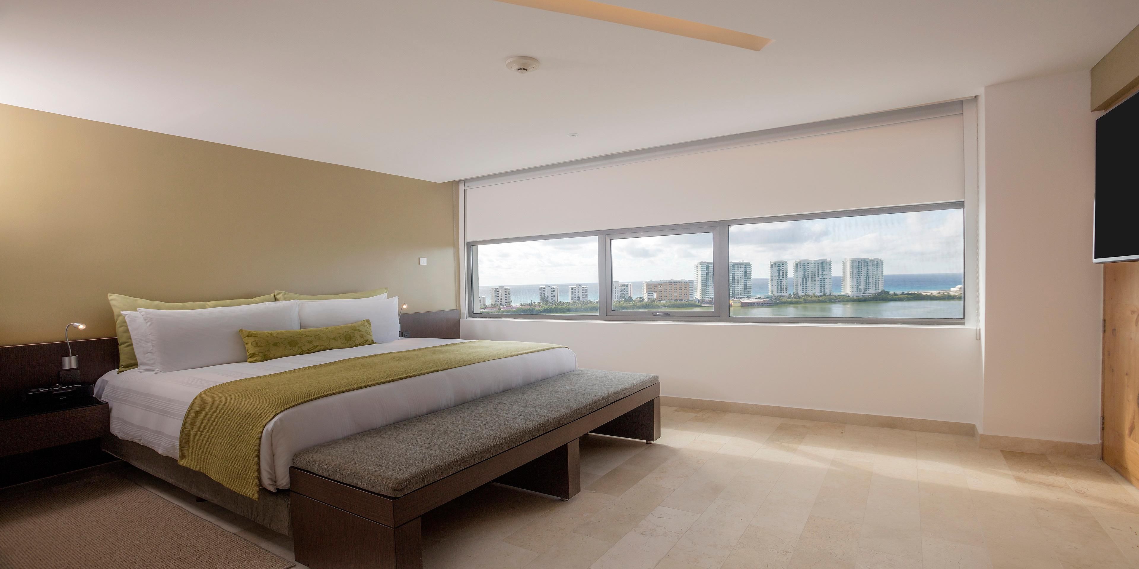 Make yourself comfortable in our rooms with a terrace lagoon view.
