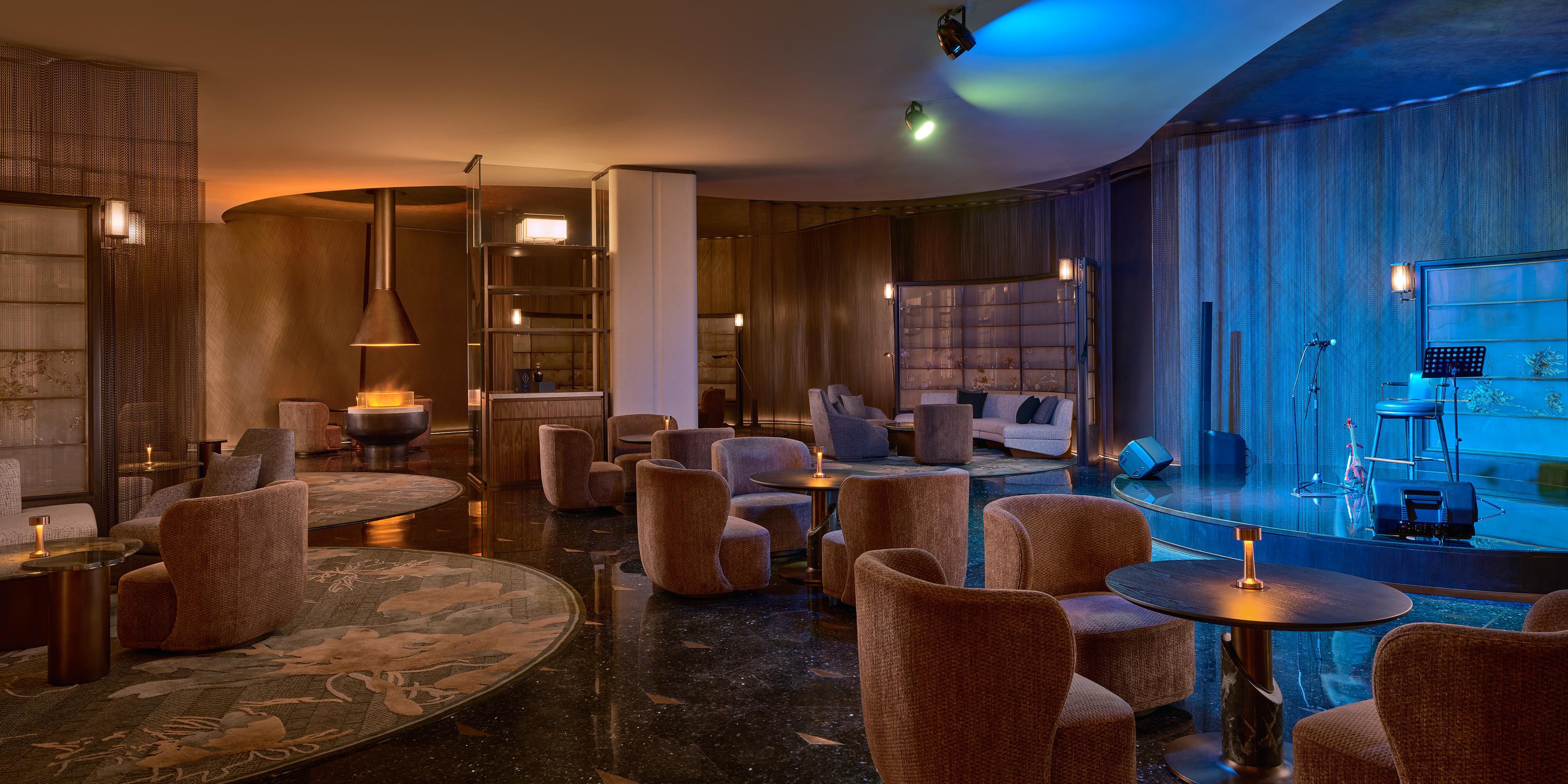 Flame Lounge reinvents the InterContinental afternoon tea tradition by fusing it with Northeastern Chinese savories, while live jazz and mixologists’ craft cocktails choreograph evening rituals.