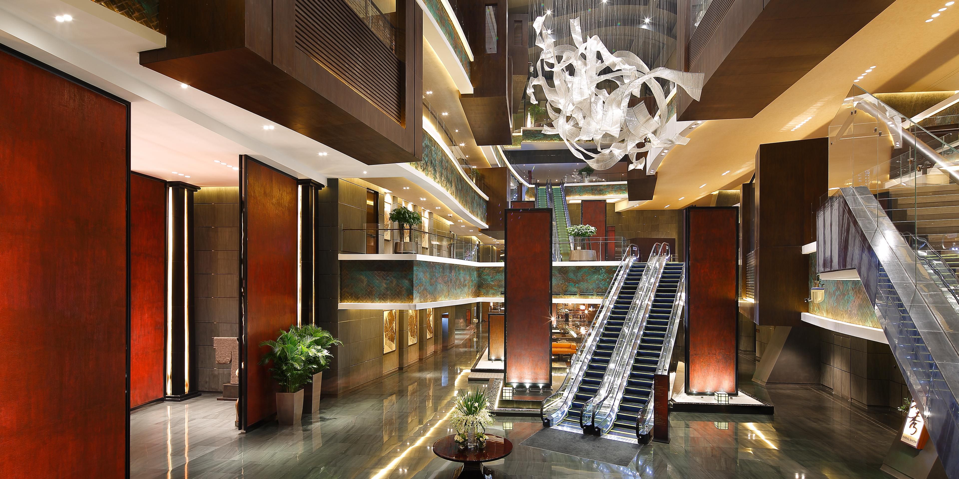 Combining the essence of the world's designers and the cultural heritage of Hunan, hotel cruiser façade and 27m high atrium defining Changsha’s architectural icon.