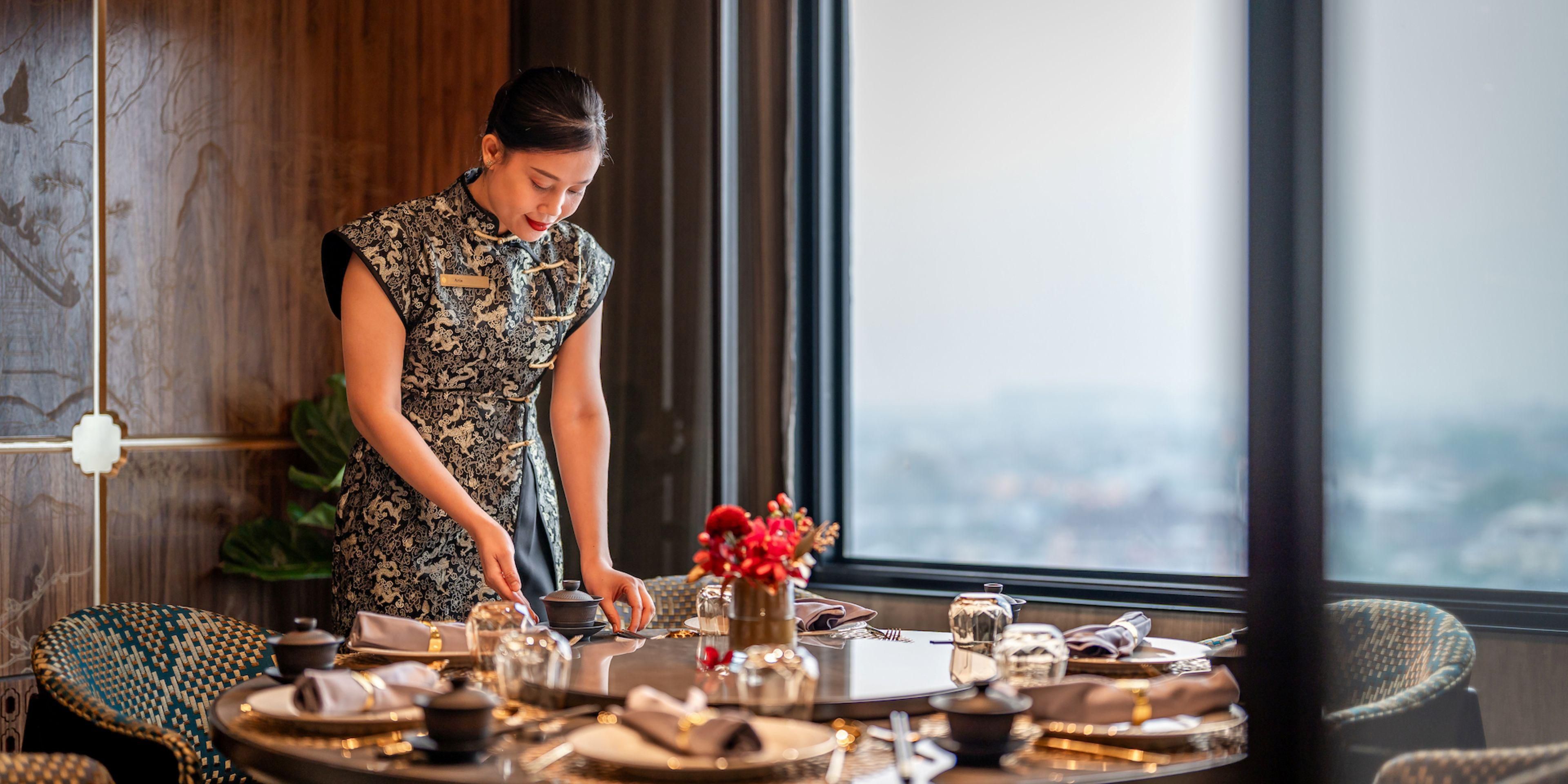 The restaurant is styled after a grand mansion from an earlier era, with traditional Chinese furnishings of fine craftsmanship that exude opulence and wealth. The culinary arts of China, including cooking methods, ways of preserving and pickling, and a variety of ingredients, are all celebrated in the heritage recipes served at the restaurant.