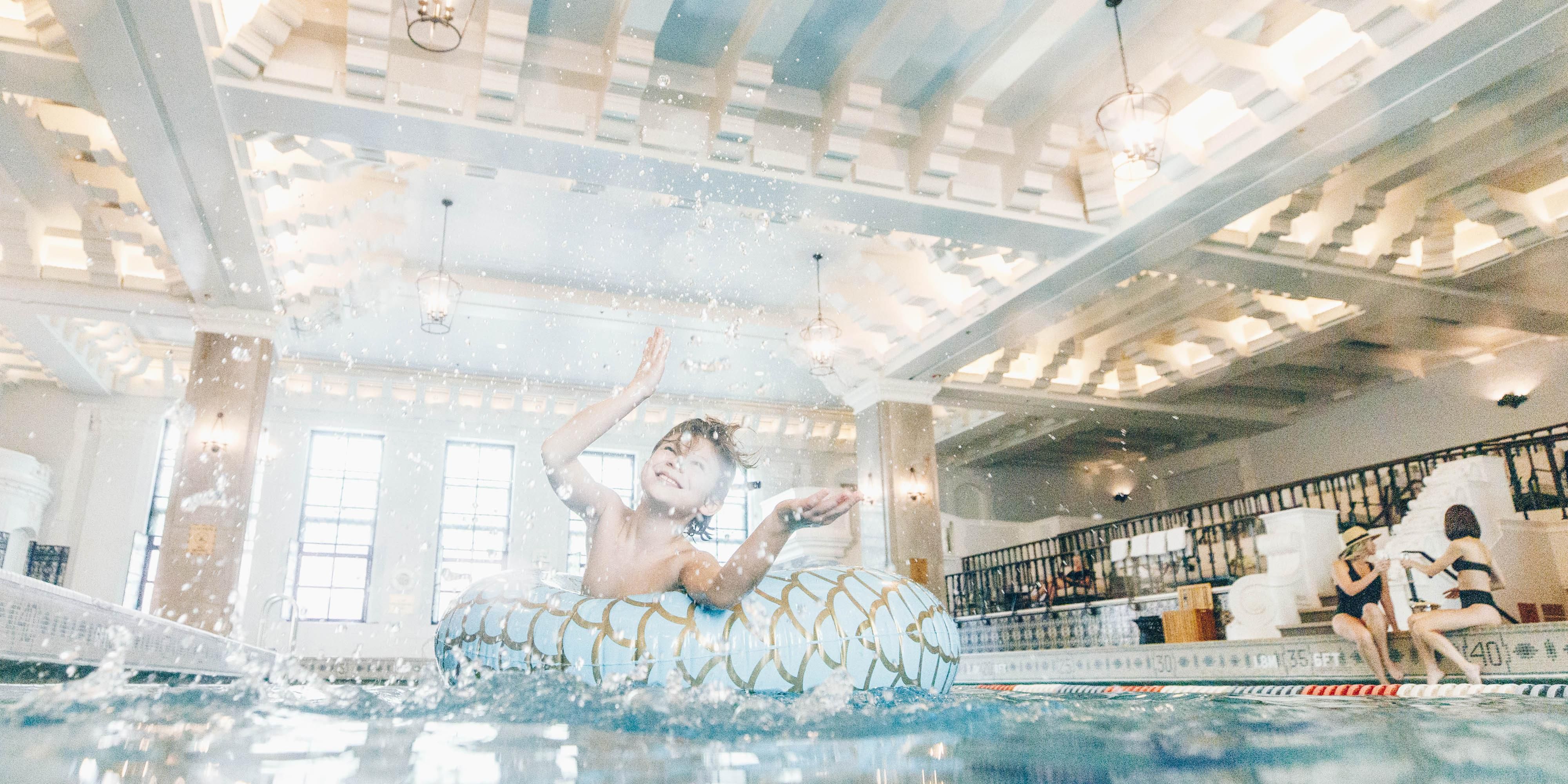 Downtown Chicago’s most beautiful indoor pool offers a family-friendly retreat in the heart of the Windy City. Swim 14 stories above the Magnificent Mile in our historic indoor Jr. Olympic size swimming pool, featuring its original 1920s Spanish tiles and a terra cotta Neptune fountain deliver a stunning backdrop for family fun.  