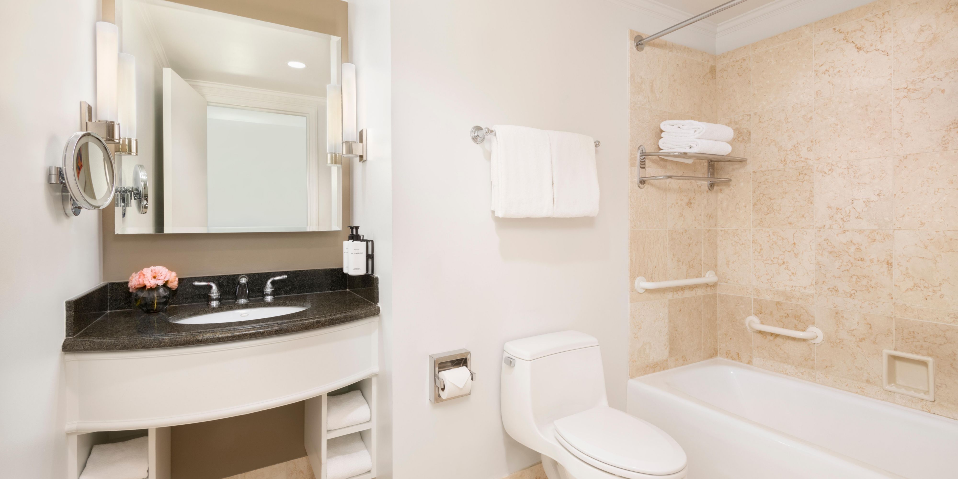 Get ready in our classic bathroom with modern marble finish.