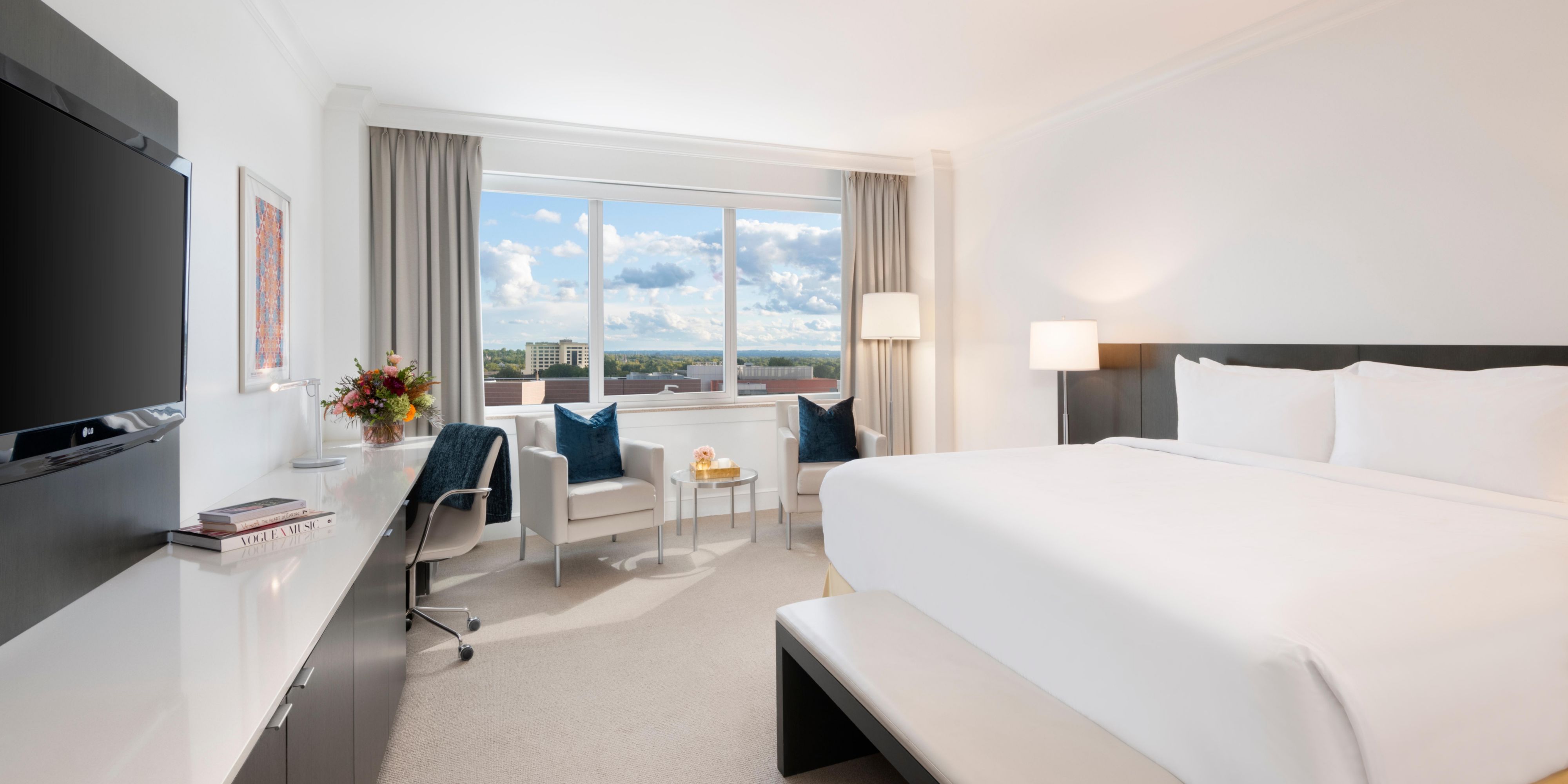 Spacious club level 1 king bedroom with Carnegie Library view. 
