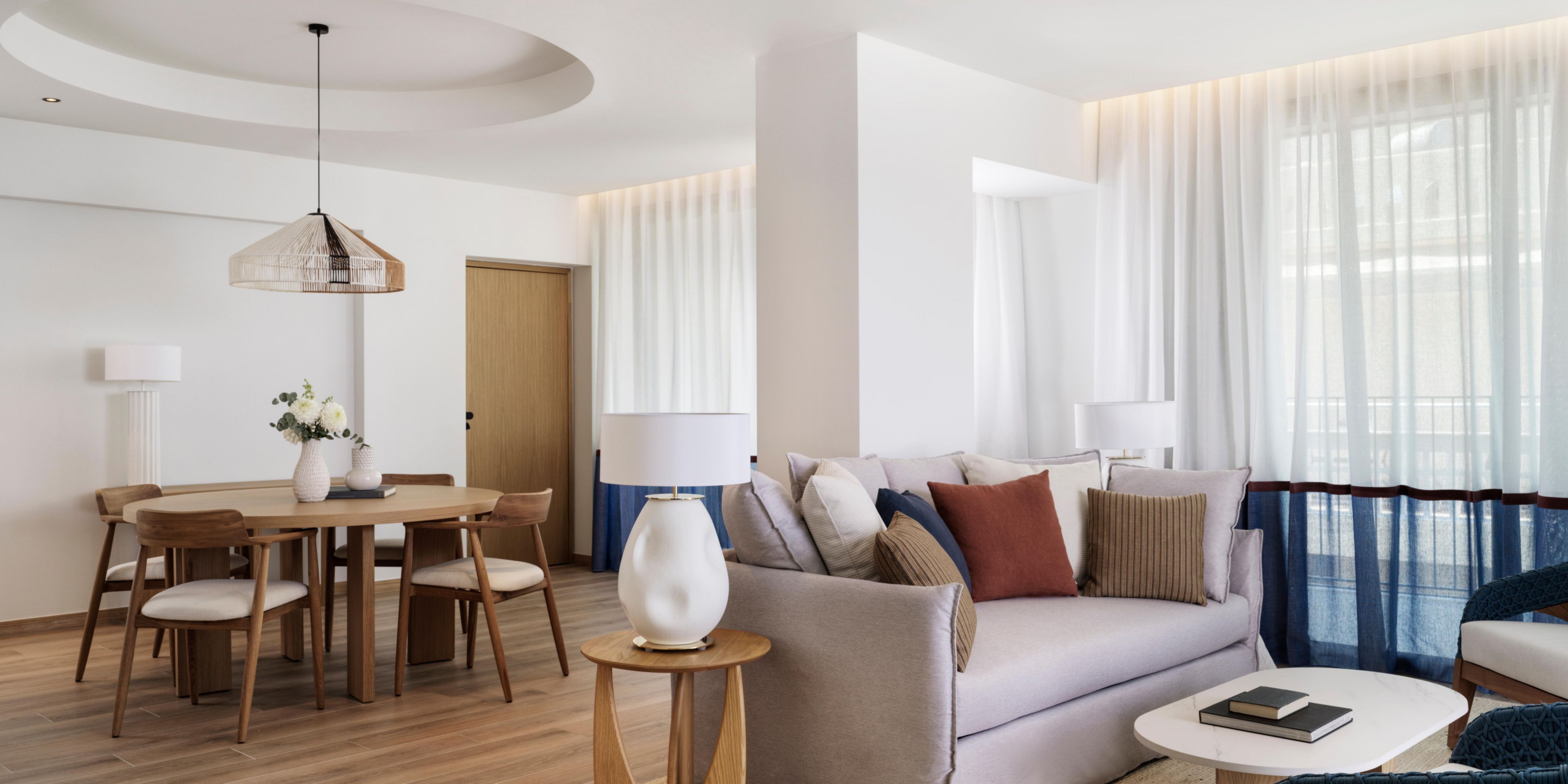 Gather and unwind in the Mirabella Suite’s modern dining space