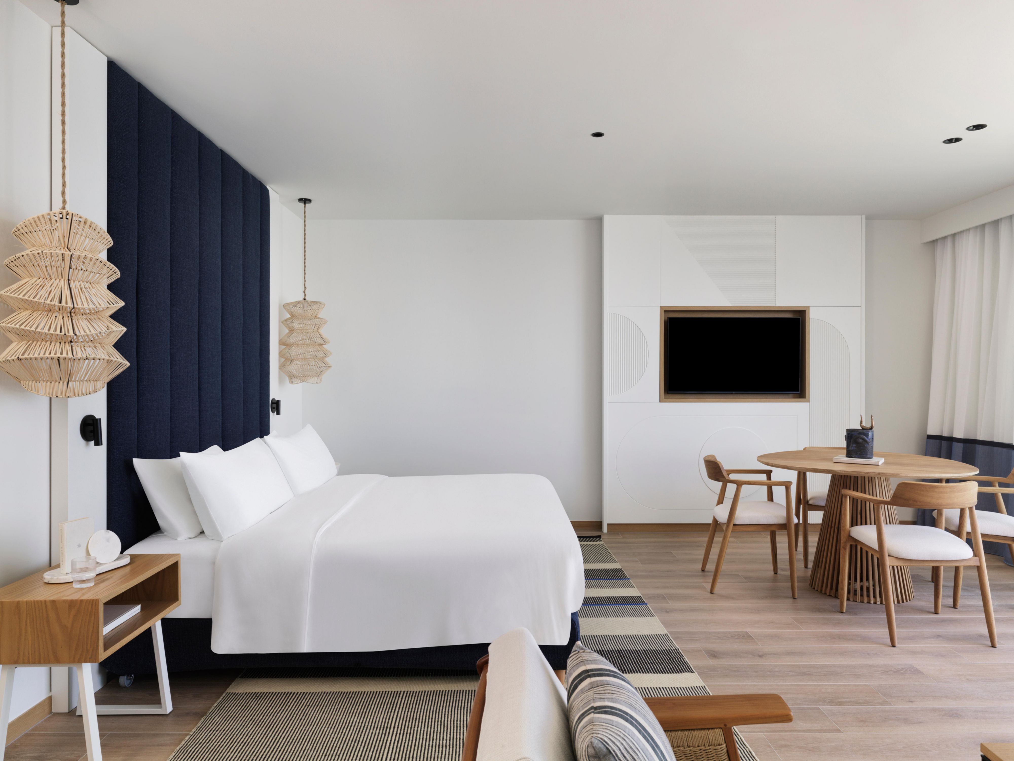 luxury king size bed in an open plan suite