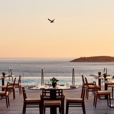 Enjoy a refined dining experience with sea views at Knossos.