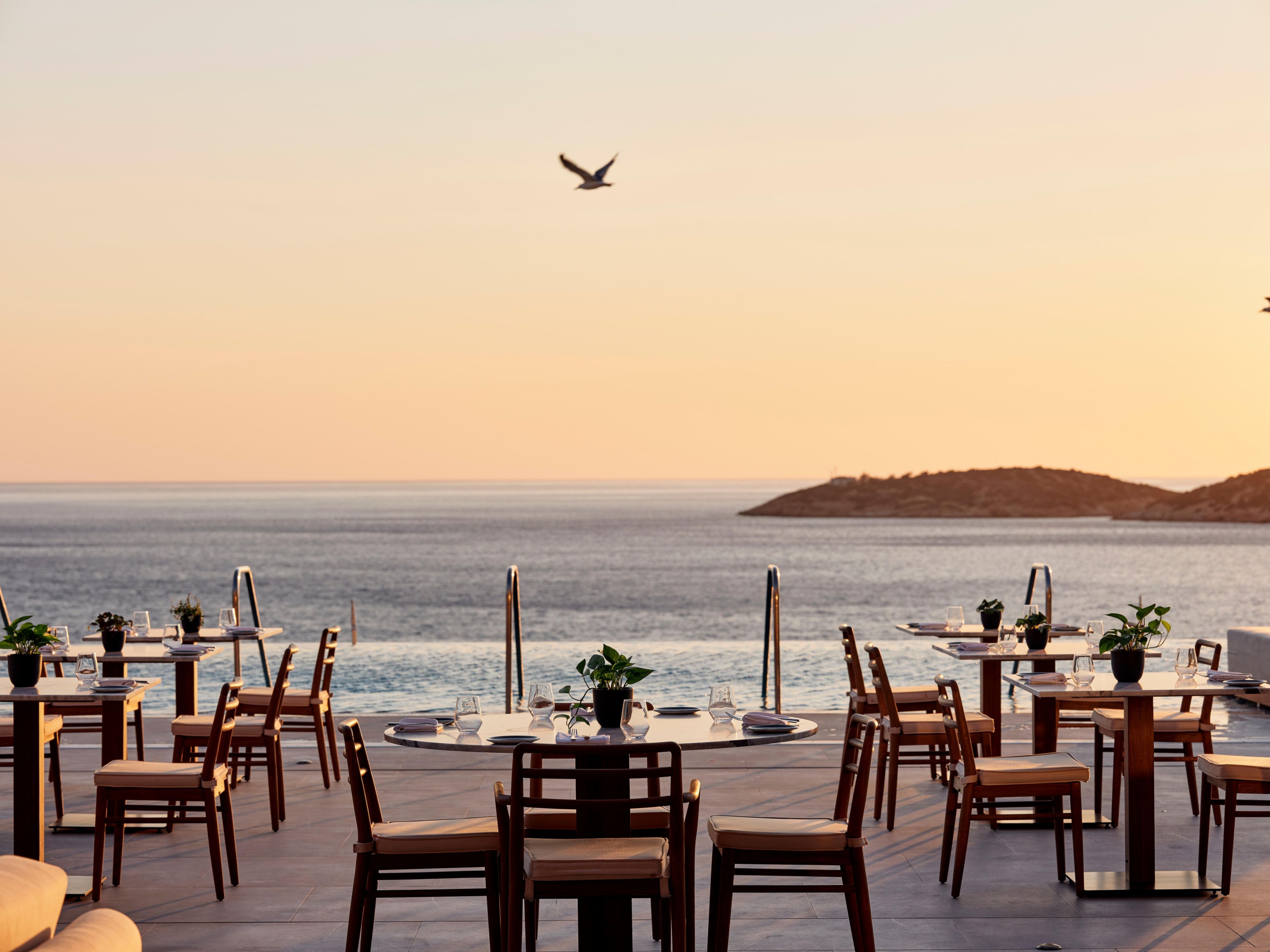 Enjoy a refined dining experience with sea views at Knossos.