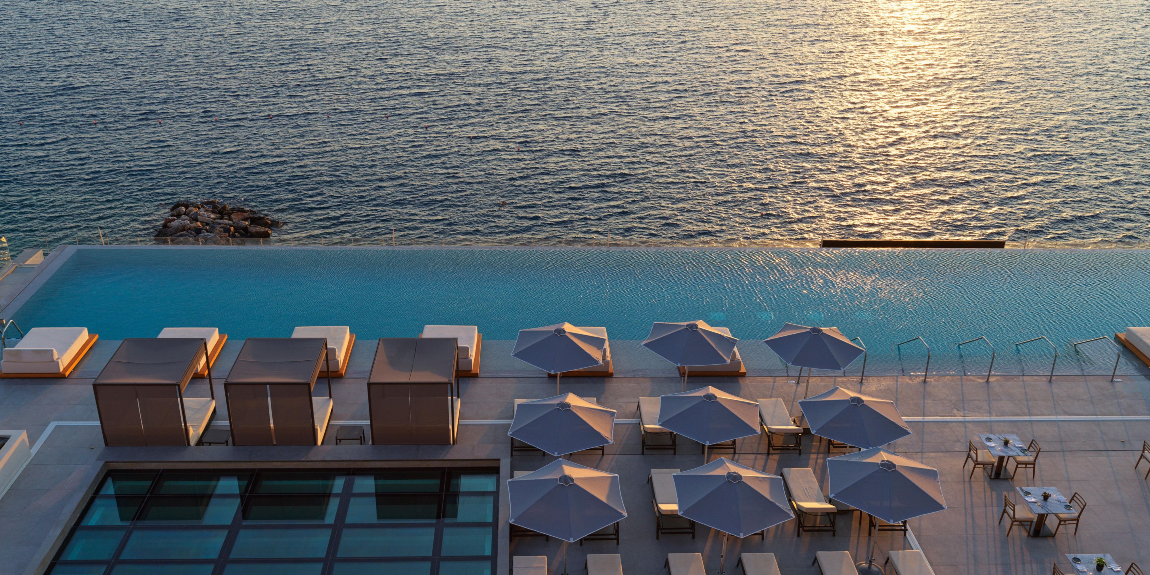 Enjoy our rooftop infinity pool with unmatched coastal panoramas.