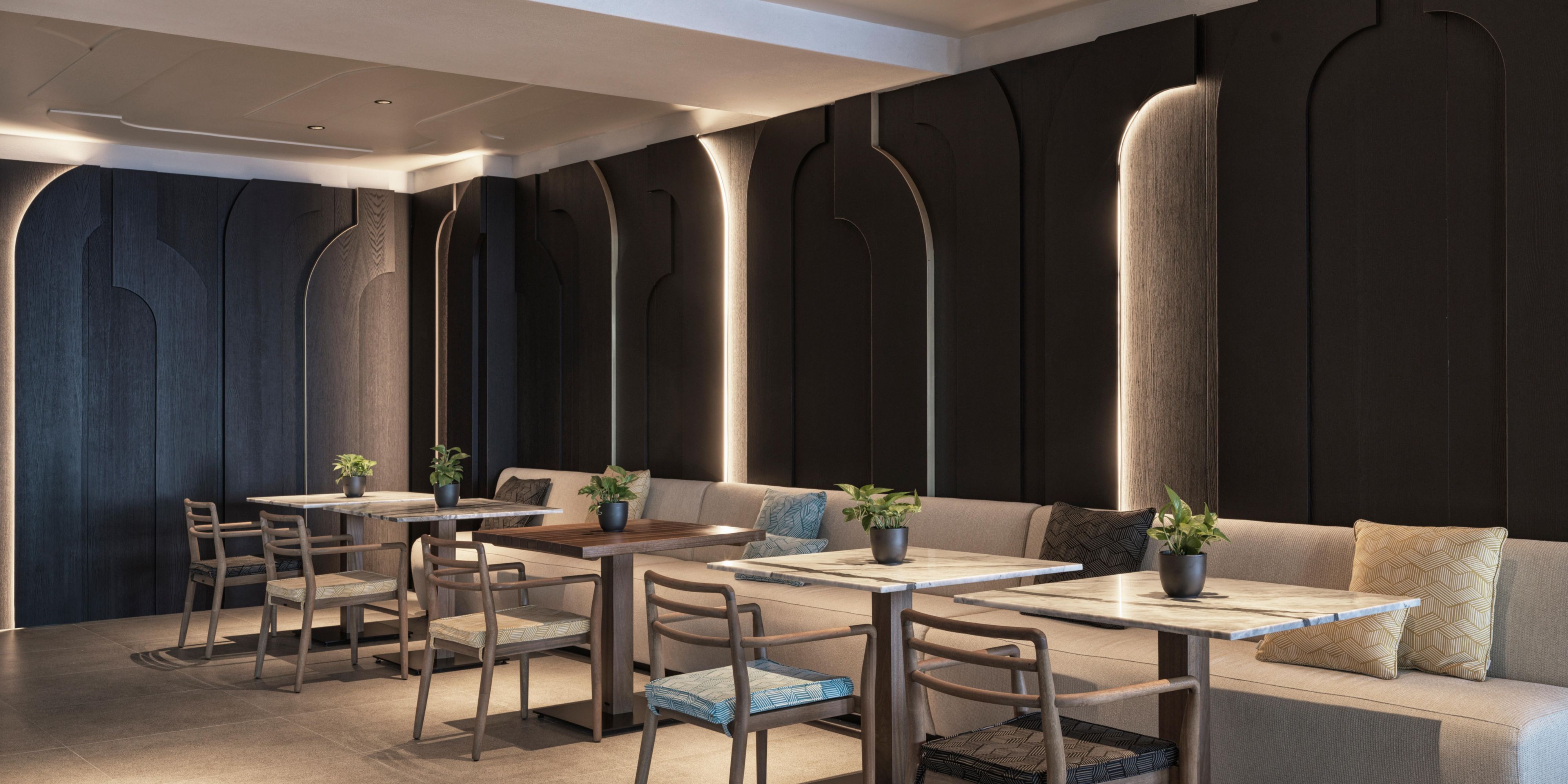 Indoor dining with at the stylish Knossos Restaurant with white booths