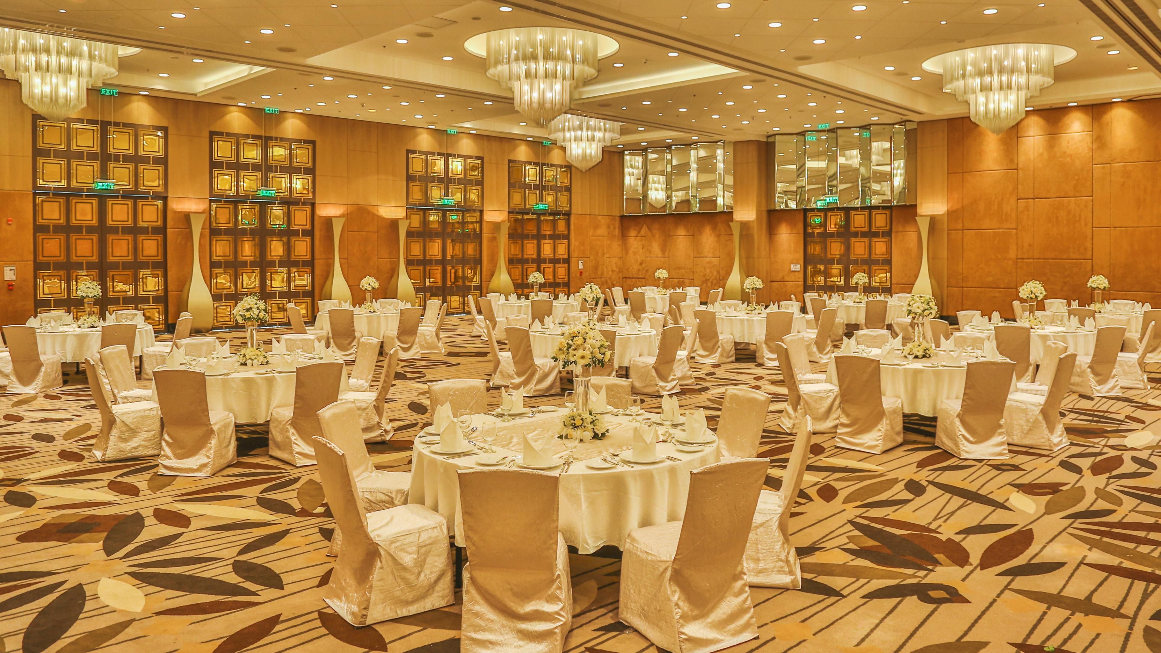 Interior of the Ruposhi Bangla Grand Ballroom with banquet seating and chandeliers at InterContinental Dhaka