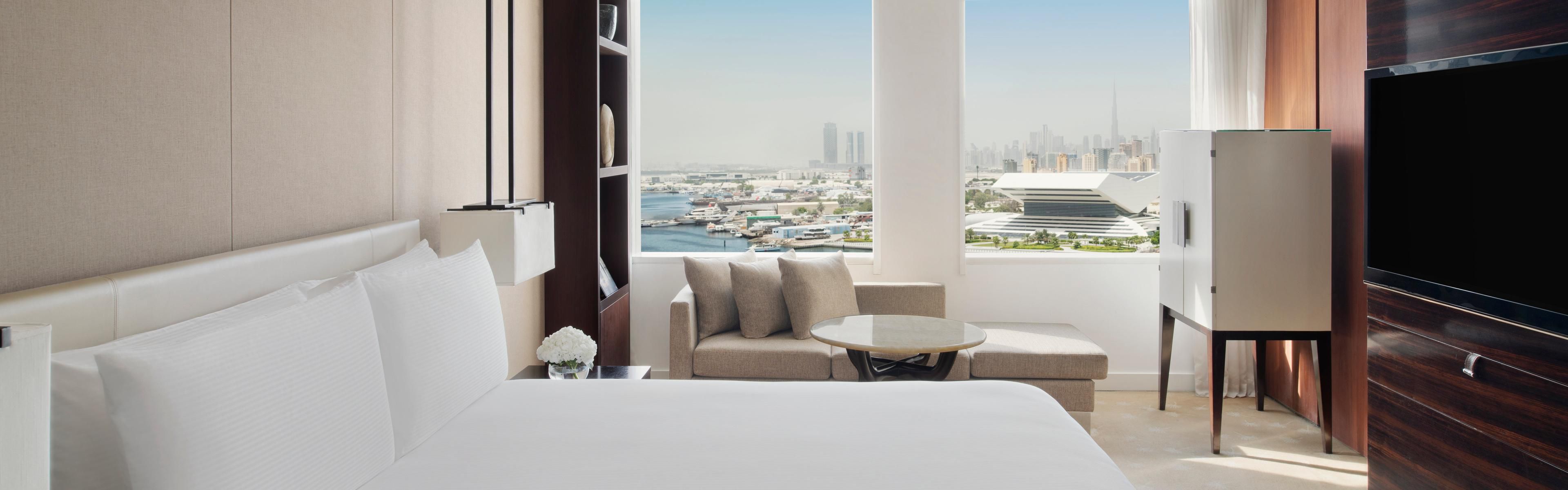 Elegant guest room with panorama of Dubai Skyline