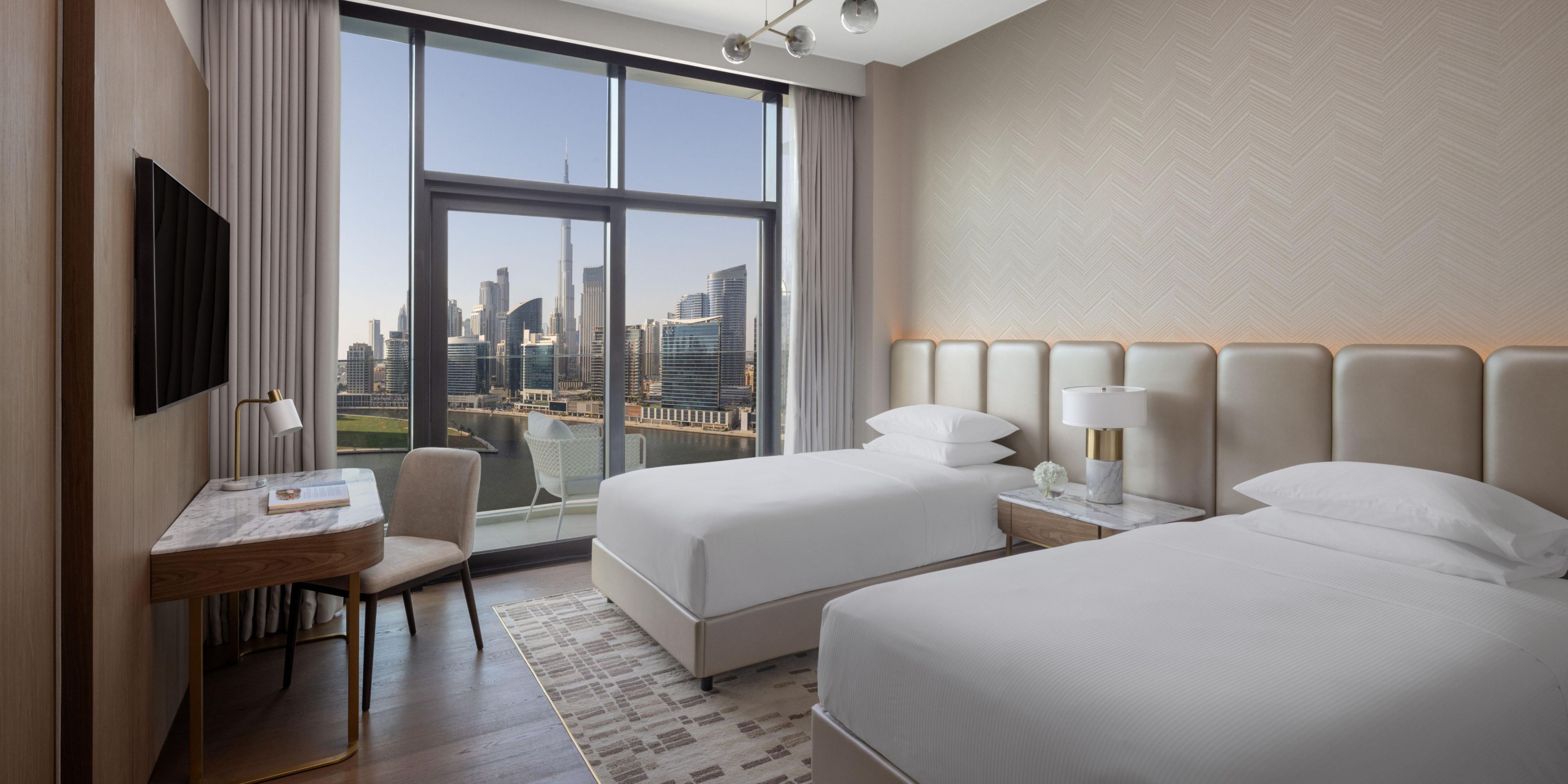 A twin room in addition to the master bedroom for families