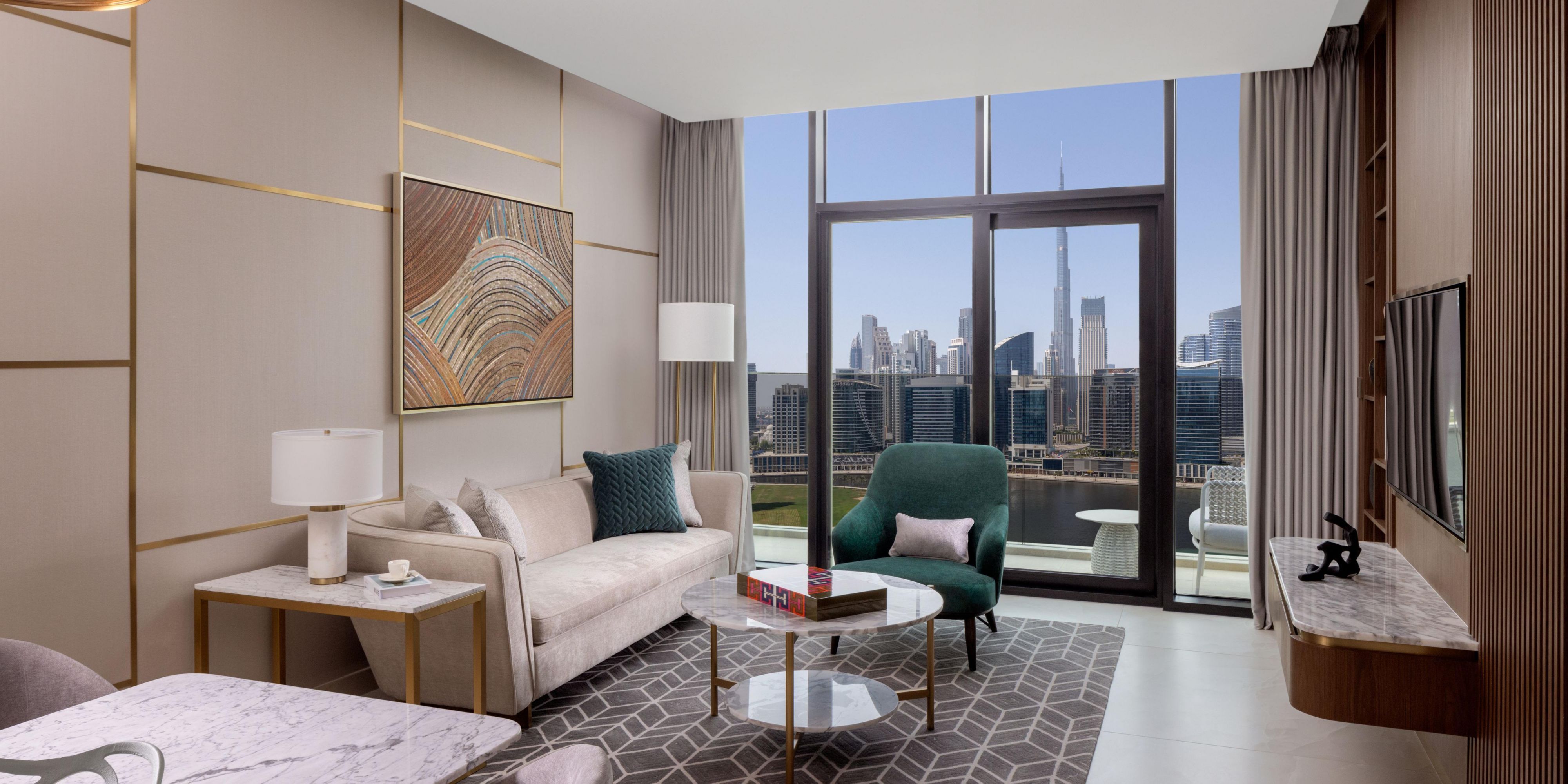 Living room with Burj Khalifa and Dubai skyline views