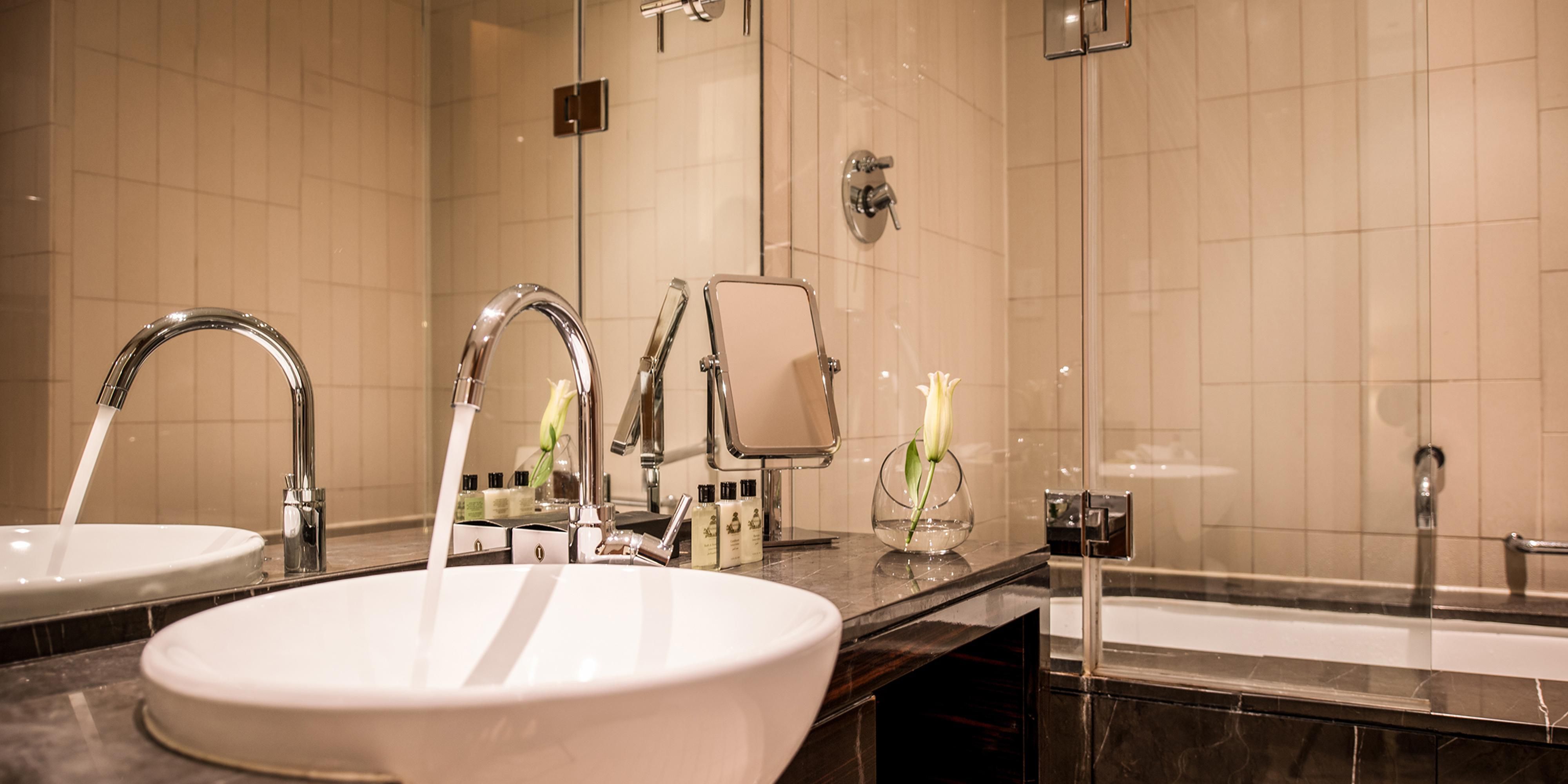 Modern and spacious bathroom with shower and bathtub