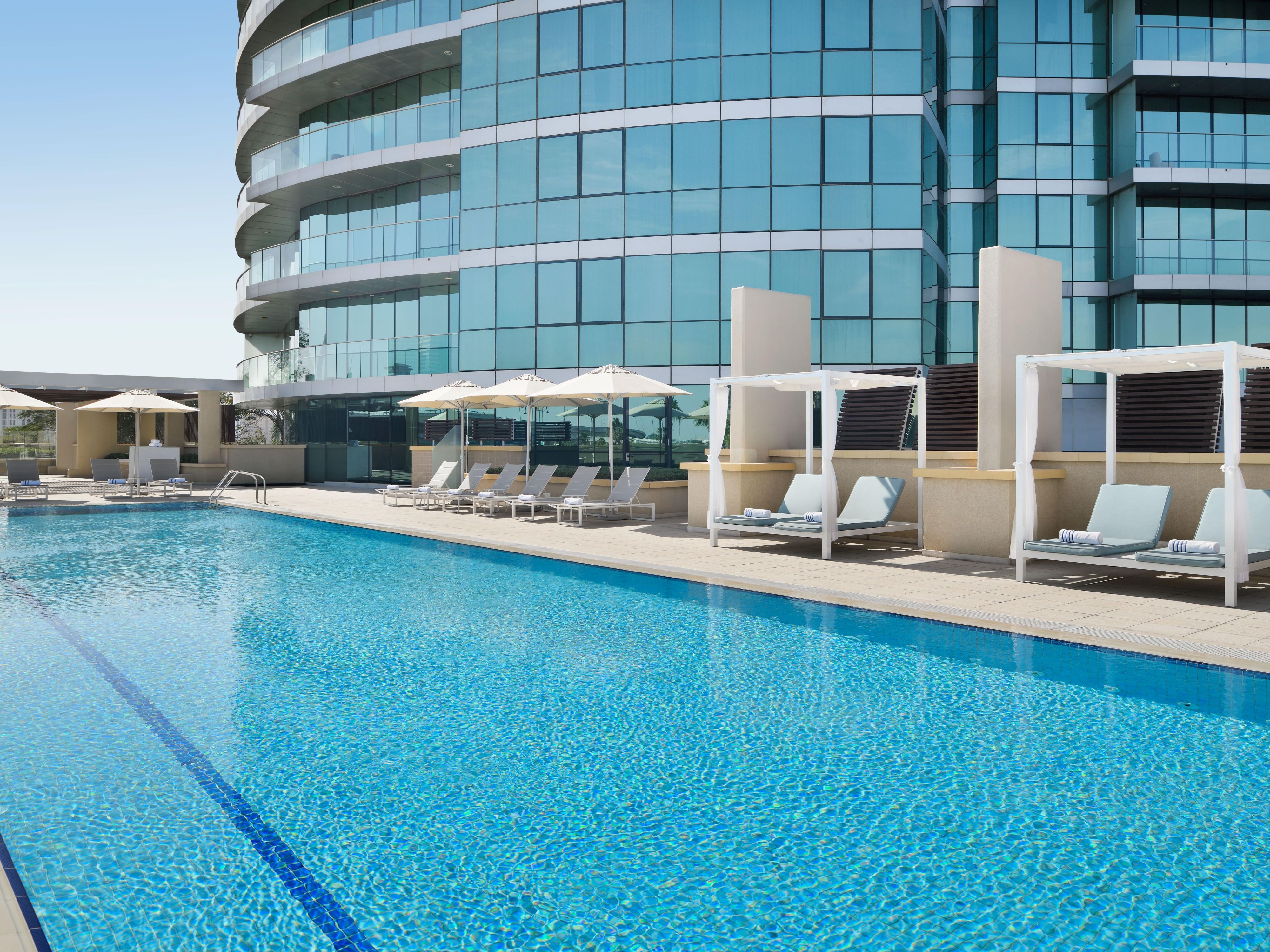 Indulge in a refined poolside retreat