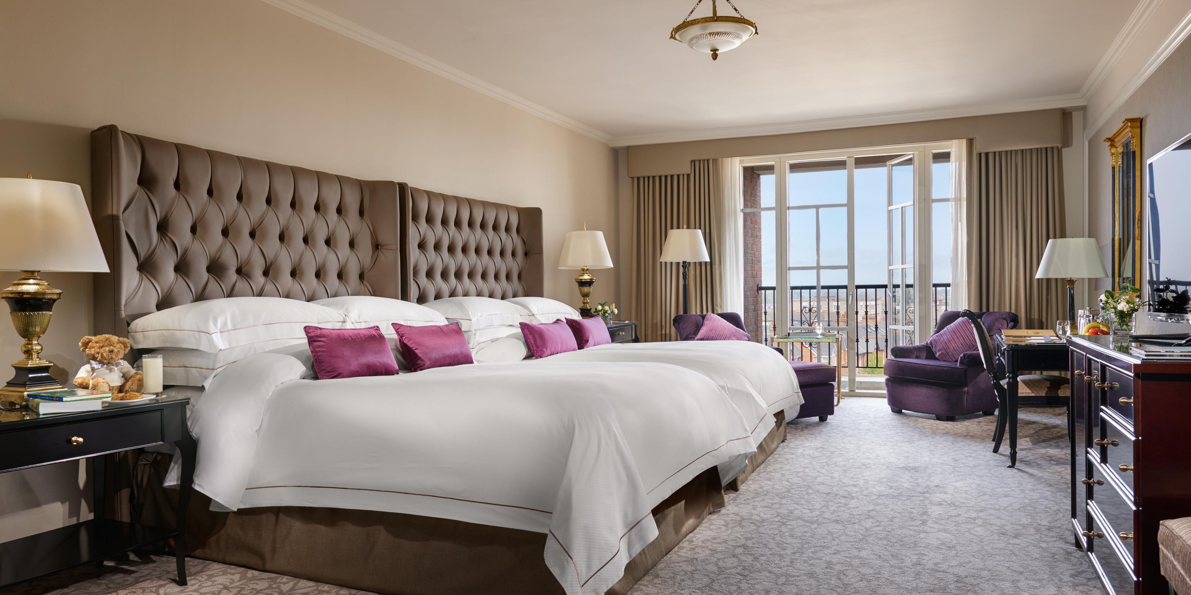 Two bed Queen Classic featuring two queen beds and a large window