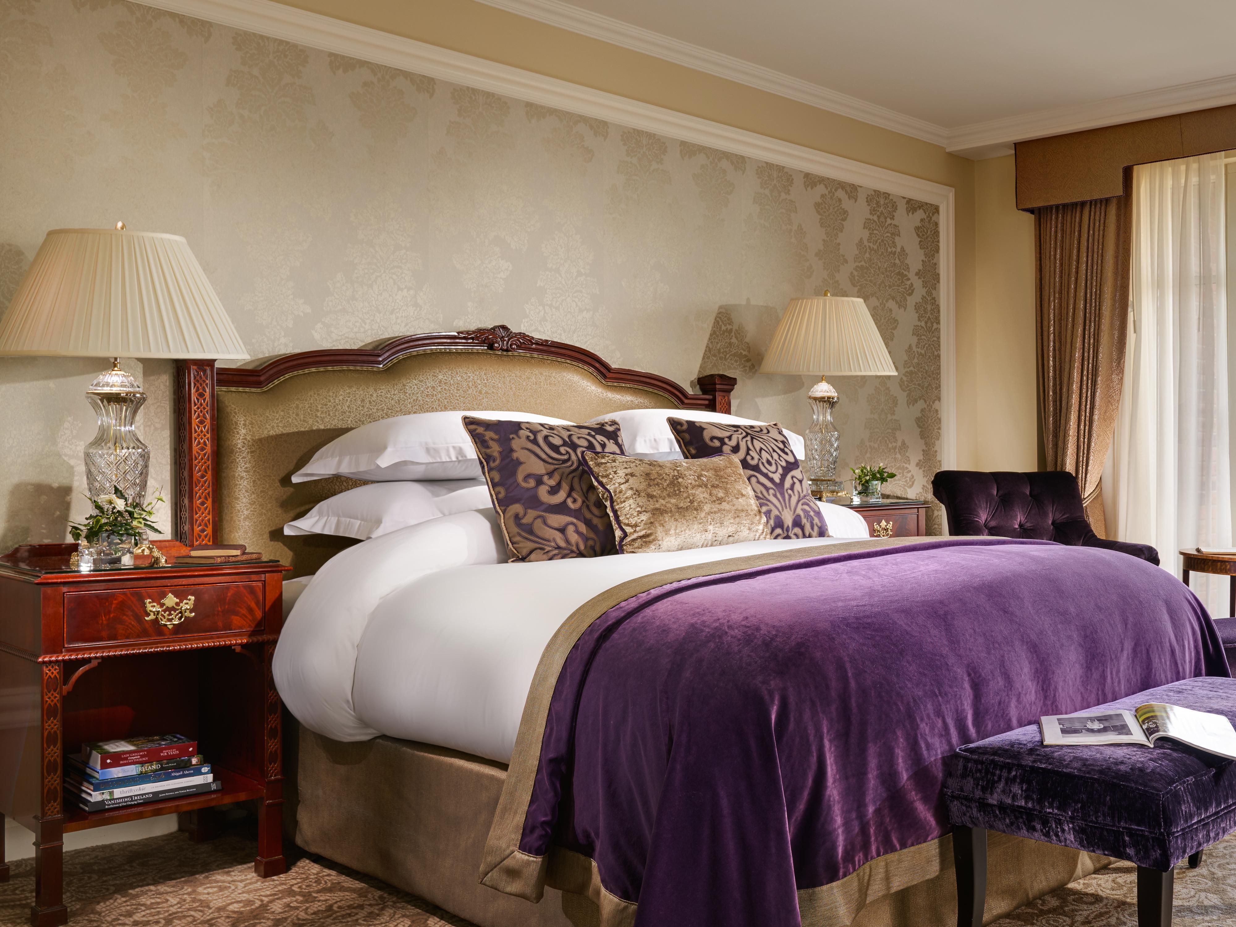 lady gregory suite with large king sized bed and distinguished interior