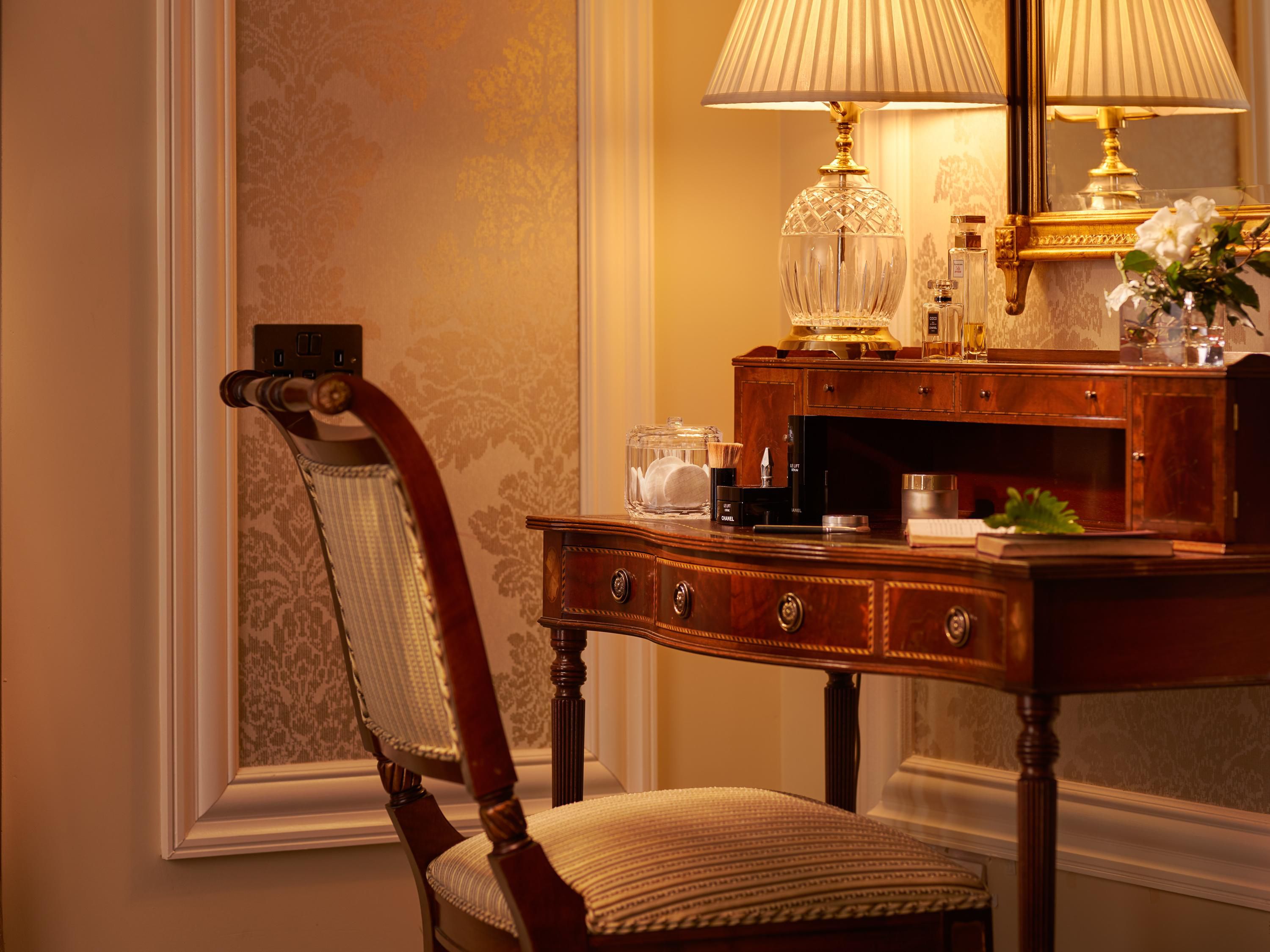 lady gregory suite with working desk and low light lamp