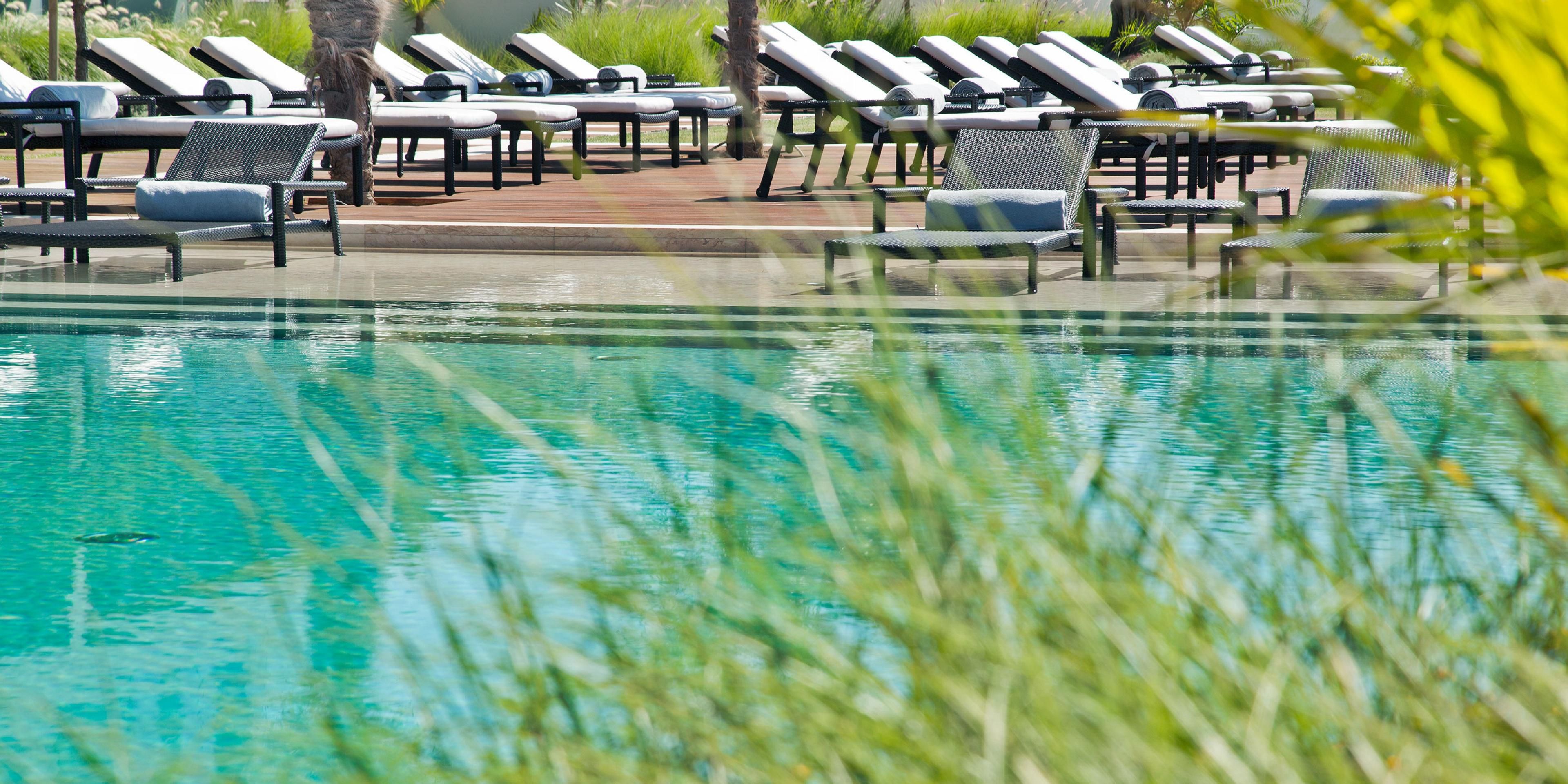 Enjoy summer days from our exclusive swimming pool area, featuring our newly refreshed Ocean Spot Pool Bar, offering delicious cocktails and light snacks.