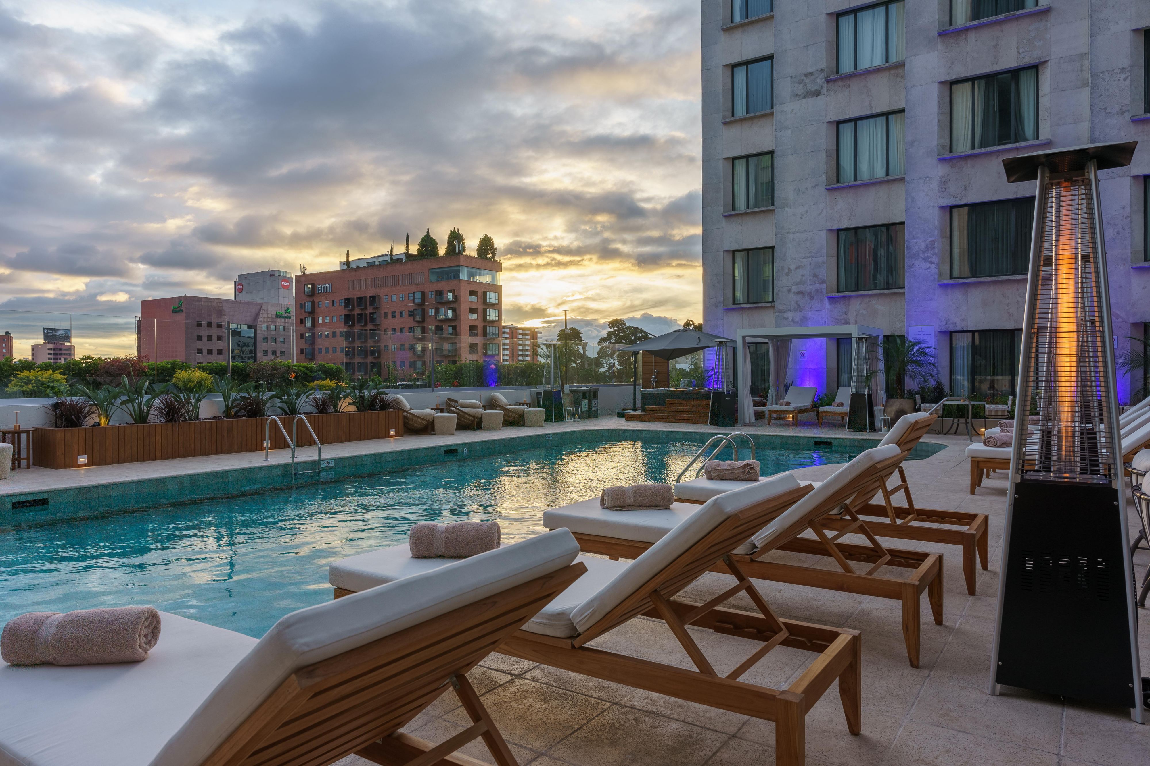 outdoor pool with cabanas 
