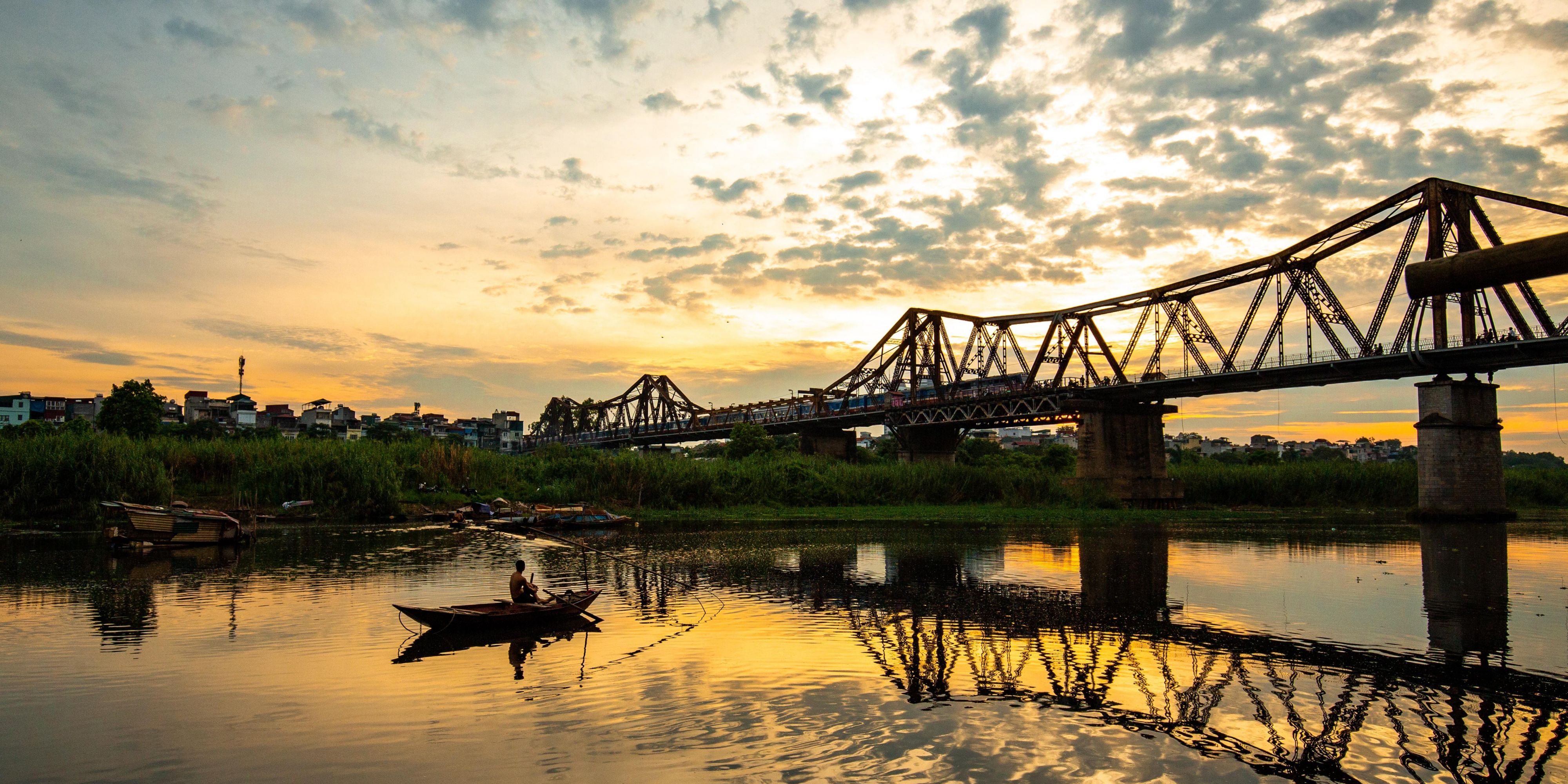 Magnificent view of Long Bien bridge at dawn.