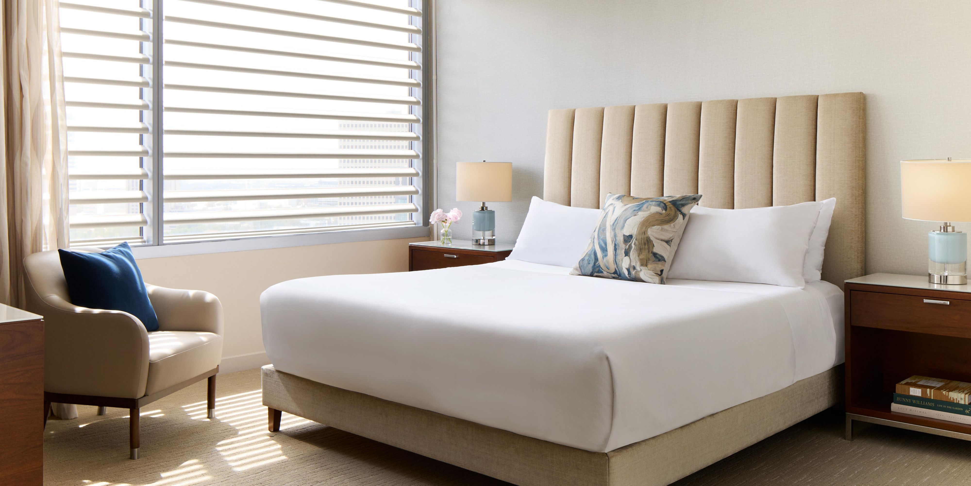 Suite with city skyline view and modern furnishings