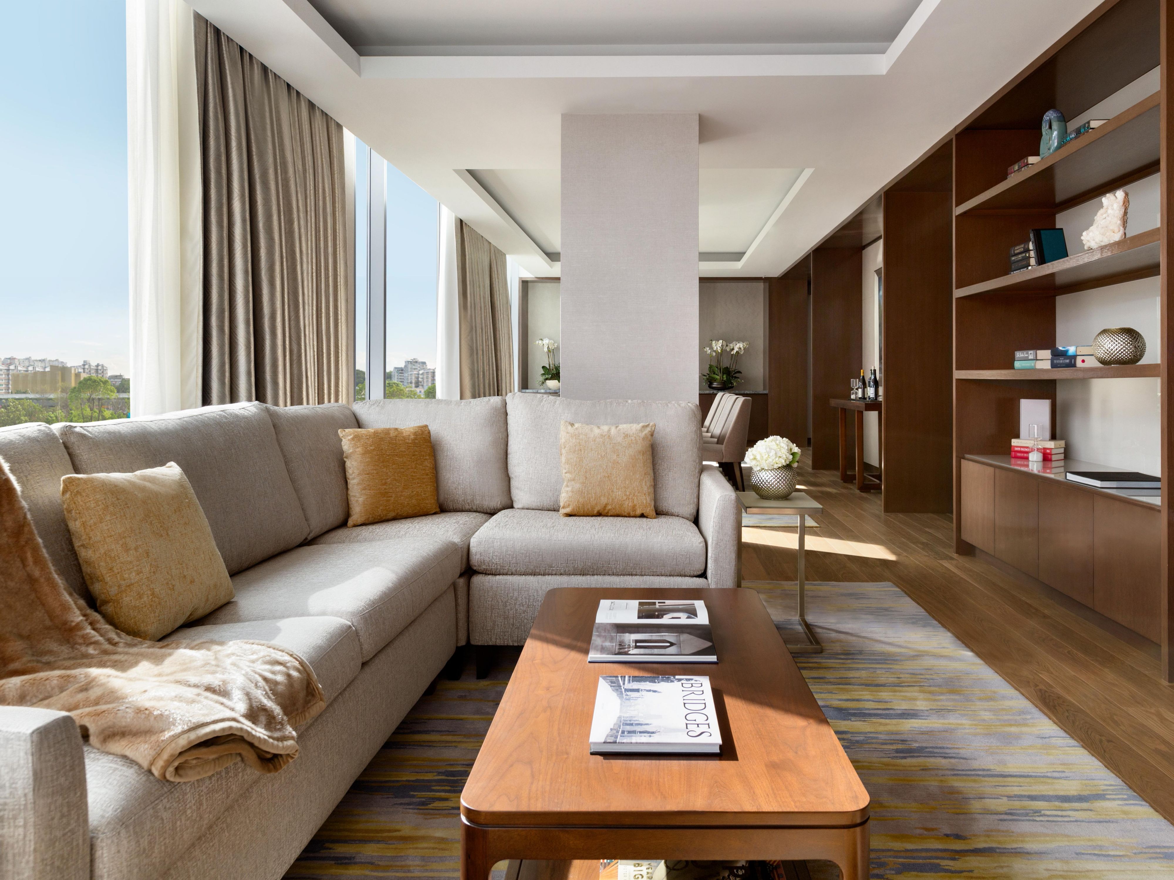 Relax in the plush living room of the Presidential Suite.