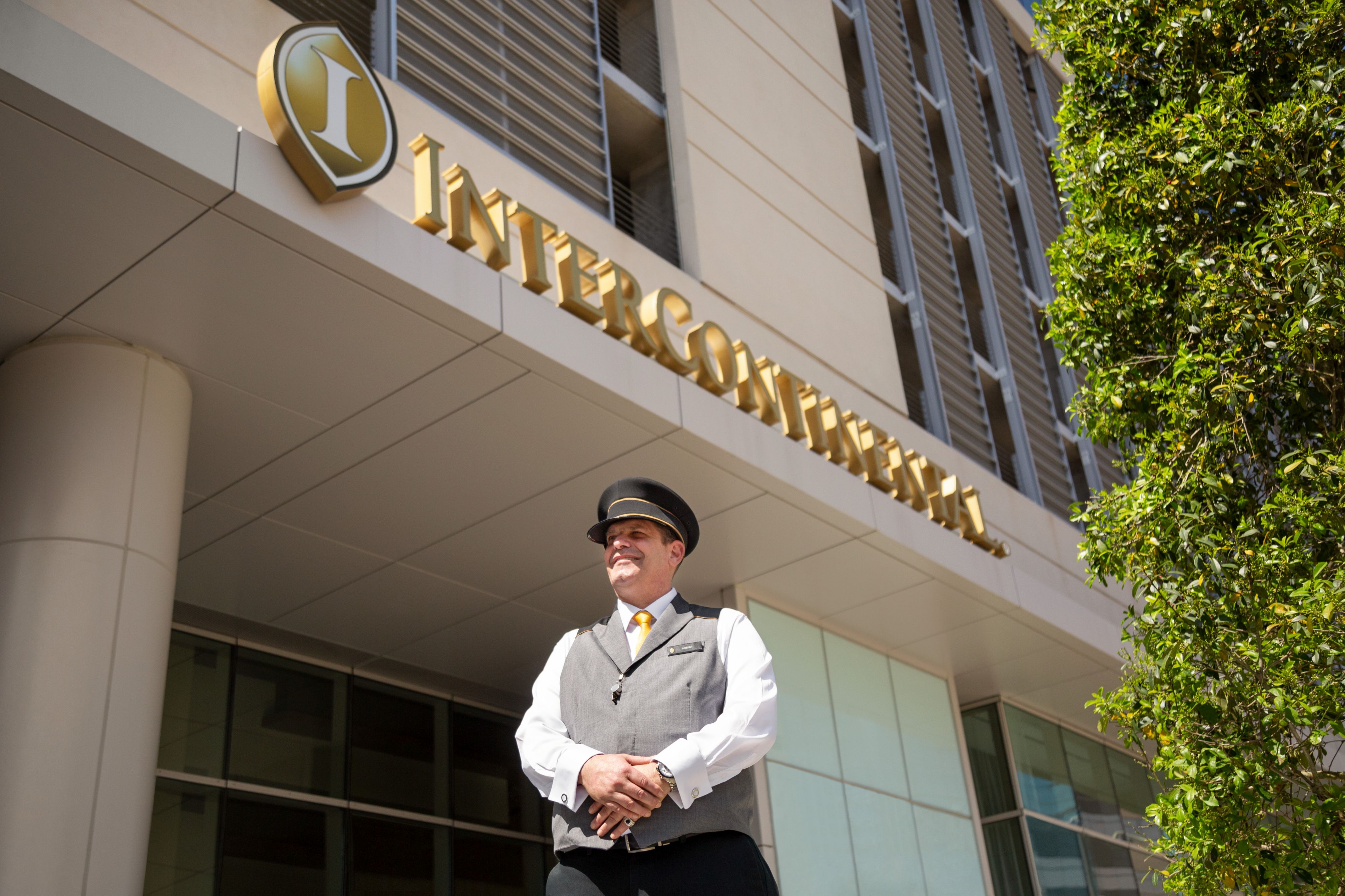 Doorman standing outside InterContinental hotel entrance