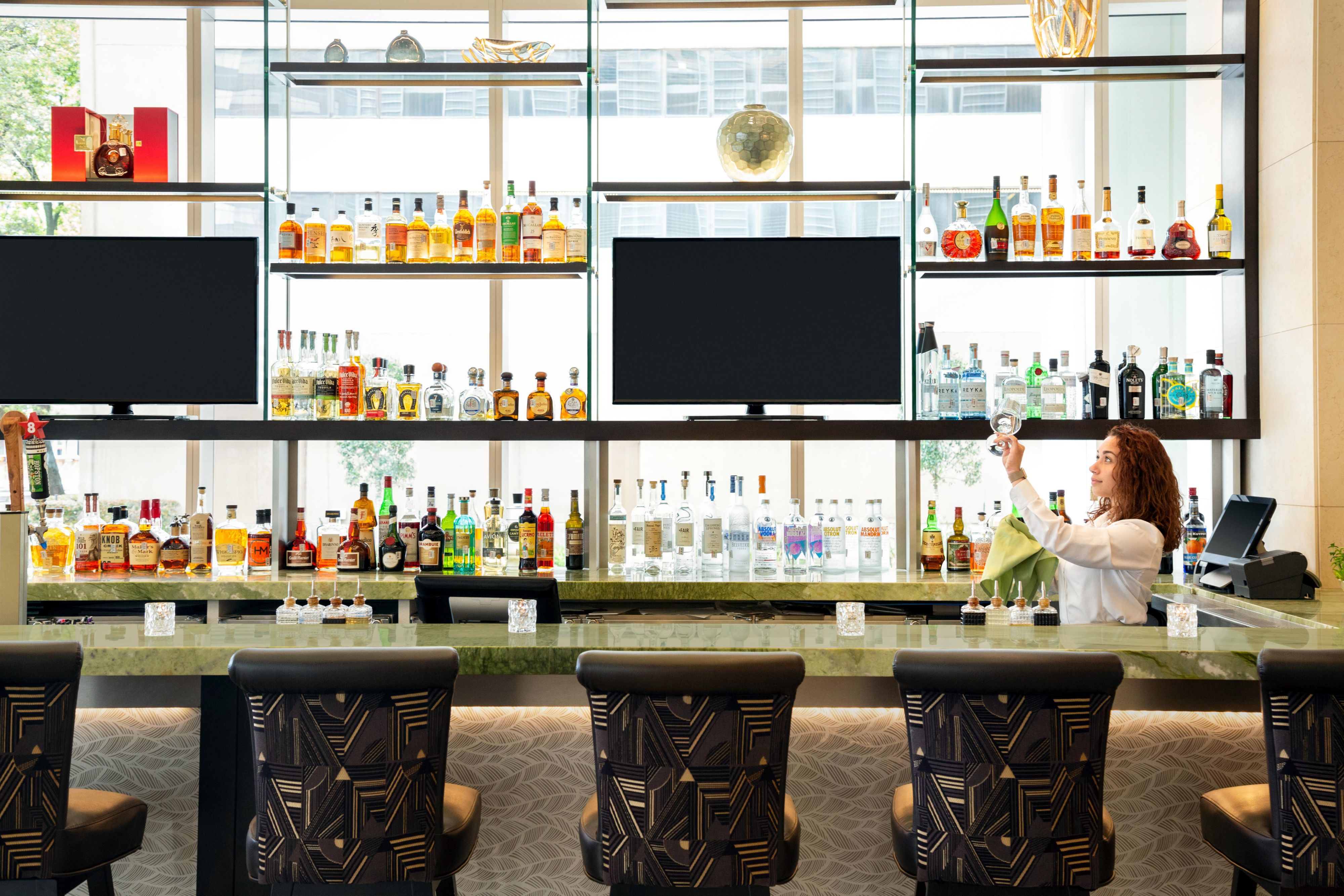 Unwind with a handcrafted cocktail at The Naturalist lobby lounge.