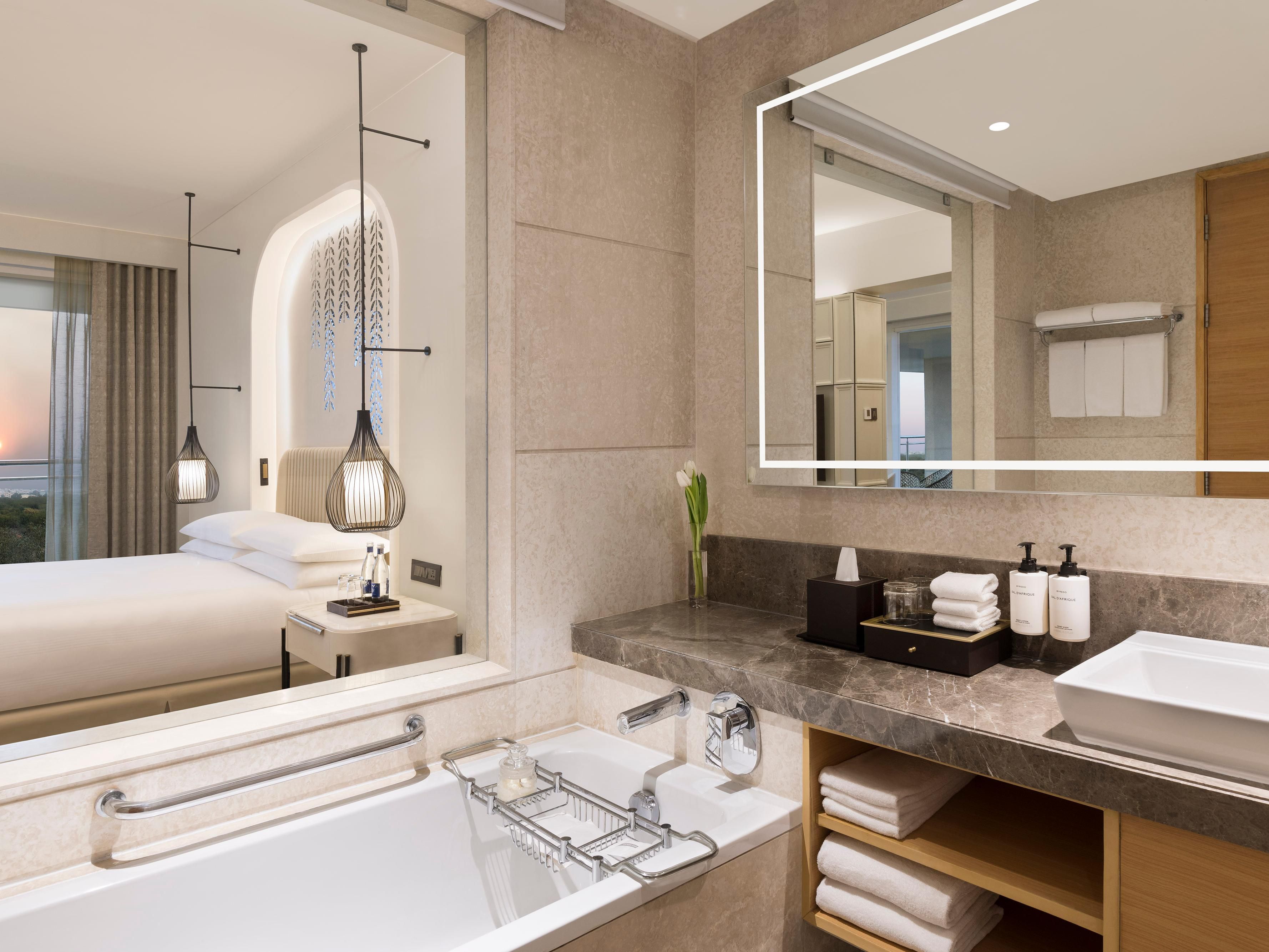 Royal Suite features an elegant bathroom with a bathtub